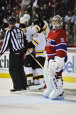 MONTREAL, QC - APRIL 18:  Carey Price #31 of the Montreal Canadiens looks away while the Boston Bruins celebrate their second goal of the game in Game Three of the Eastern Conference Quarterfinals during the 2011 NHL Stanley Cup Playoffs at Bell Centre on