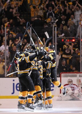 BOSTON, MA - APRIL 27: Nathan Horton #18 of the Boston Bruins celebrates with teammates after he scored the winning goal in overtime against the Montreal Canadiens in Game Seven of the Eastern Conference Quarterfinals during the 2011 NHL Stanley Cup Playo