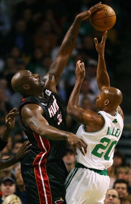 BOSTON - NOVEMBER 16:  Shaquille O'Neal #32 of the Miami Heat blocks a shot by Ray Allen #20 of the Boston Celtics on November 16, 2007 at the TD Banknorth Garden in Boston, Massachusetts. NOTE TO USER: User expressly acknowledges and agrees that, by down