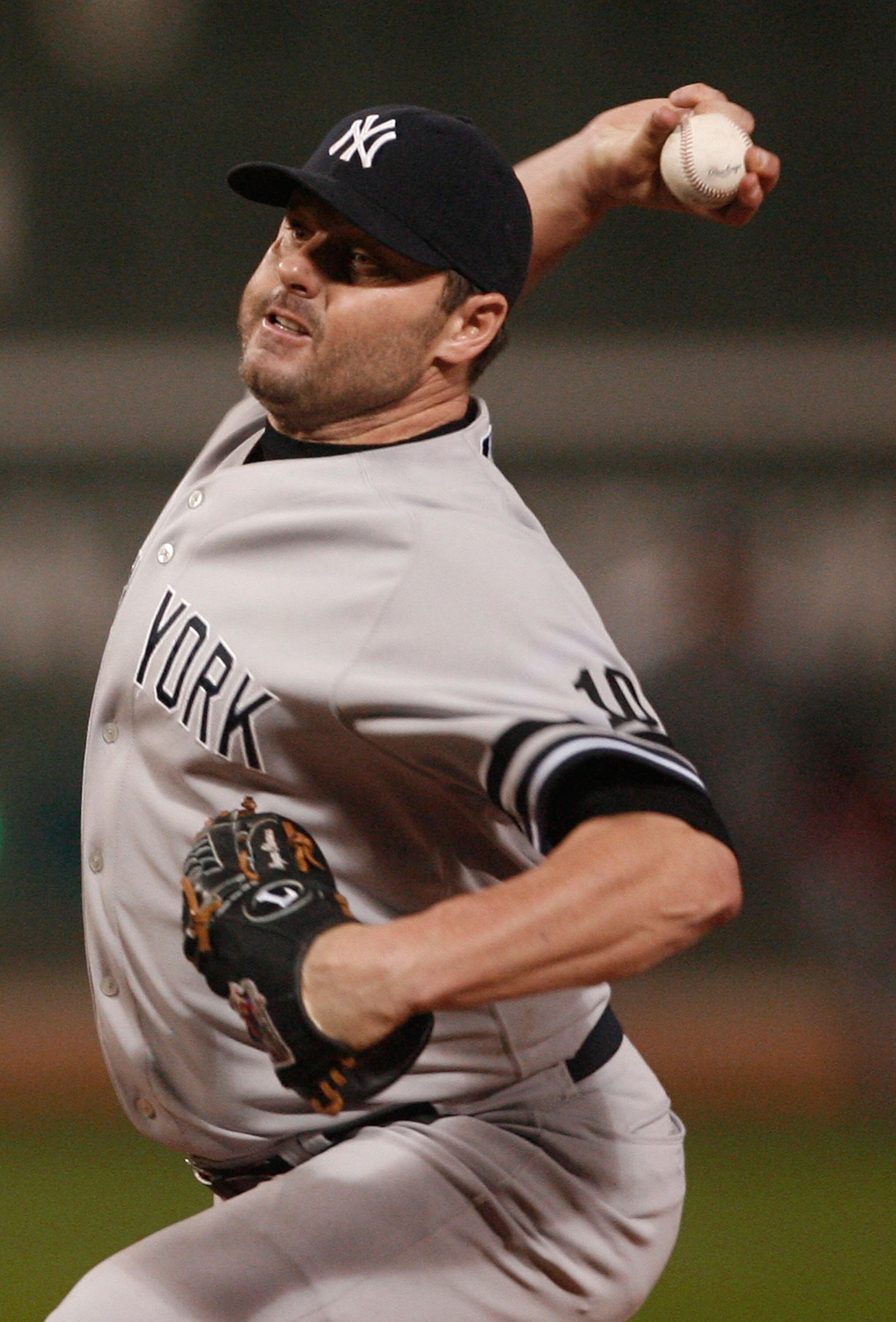 BOSTON - SEPTEMBER 16:  Roger Clemens #22 of the New York Yankees throw during a game against the Boston Red Sox  at Fenway Park on September 16, 2007 in Boston, Massachusetts.  (Photo by Jim Rogash/Getty Images)