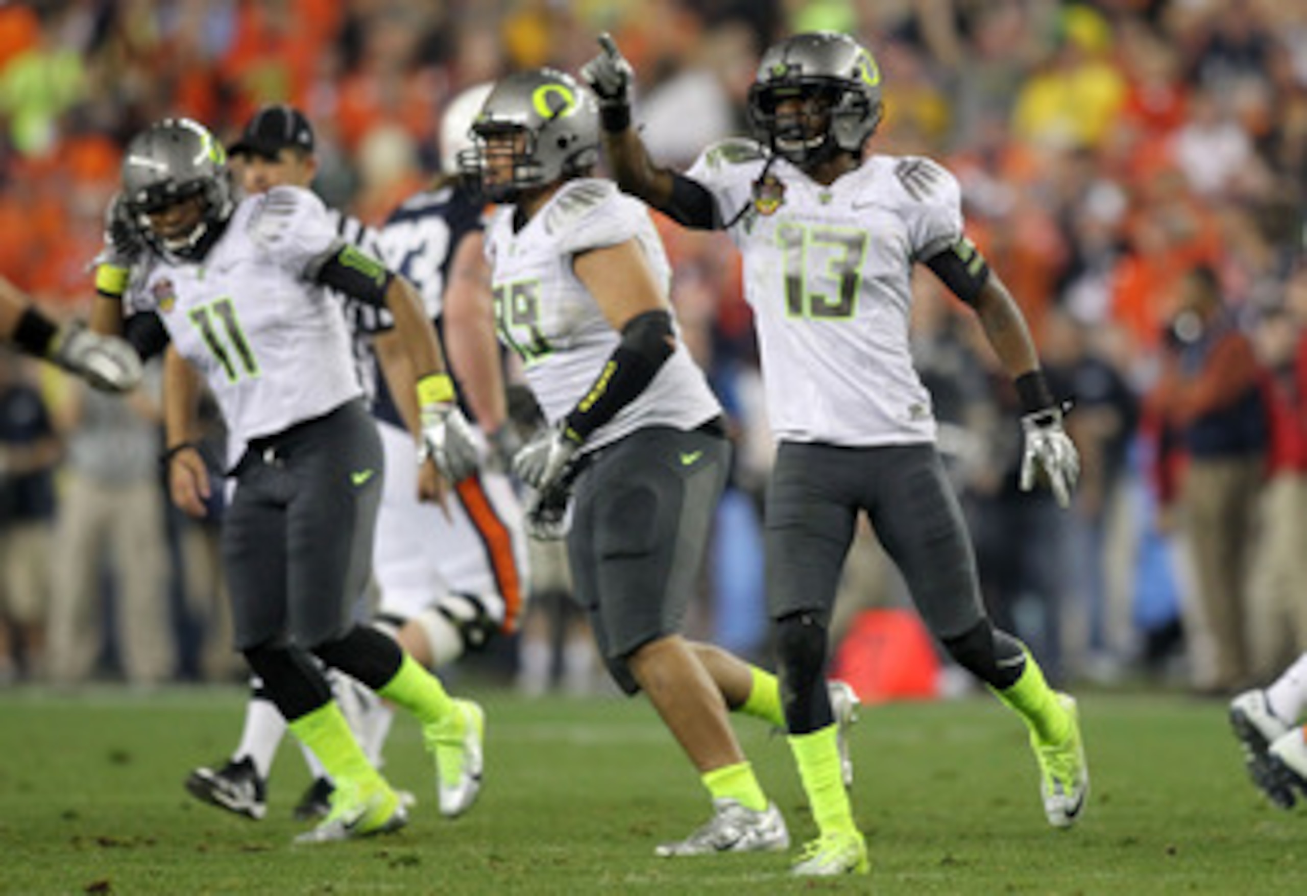 GLENDALE, AZ - JANUARY 10:  Cliff Harris #13 of the Oregon Ducks reacts during their game against the Auburn Tigers during the Tostitos BCS National Championship Game at University of Phoenix Stadium on January 10, 2011 in Glendale, Arizona.  (Photo by Jo