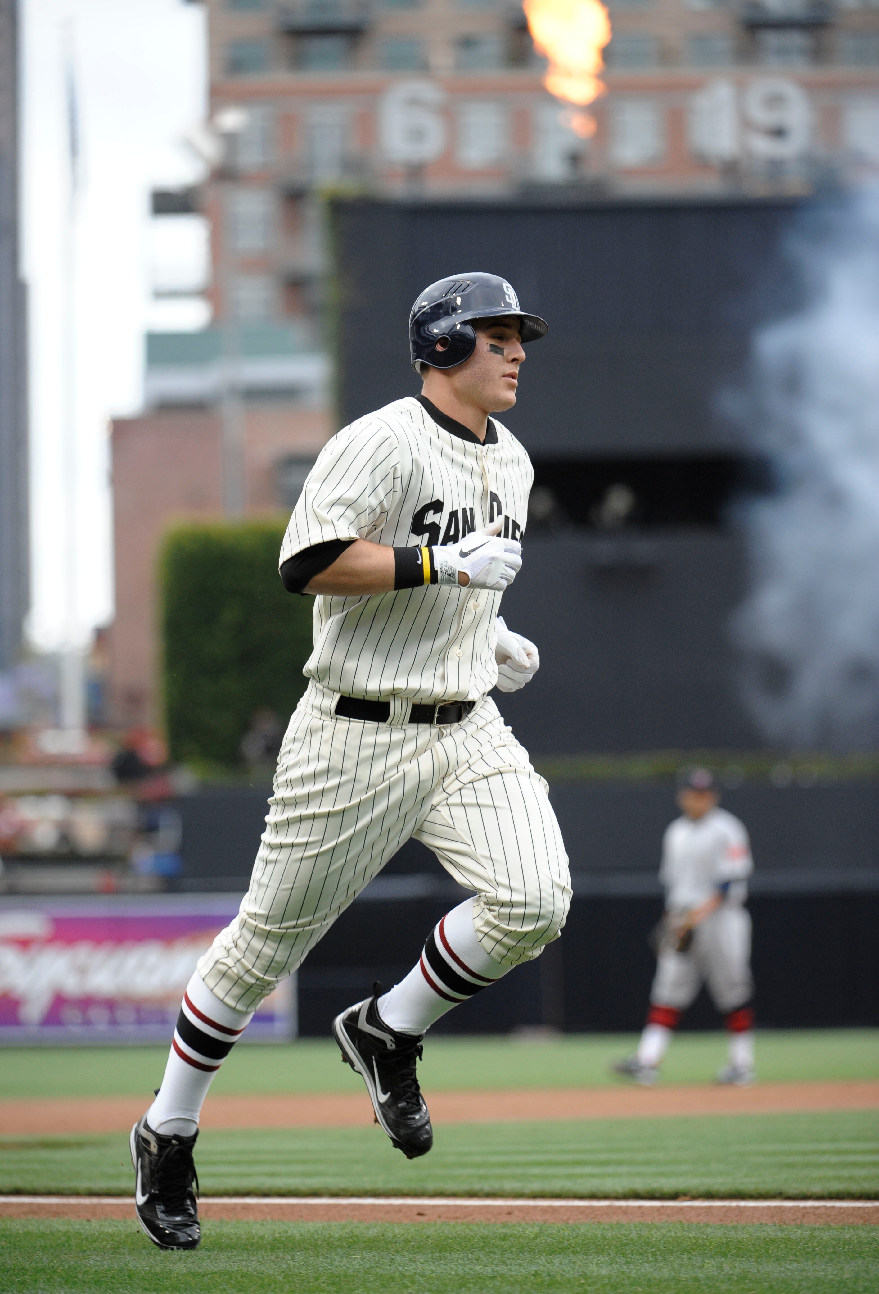 SAN DIEGO, CA - JUNE 11: Anthony Rizzo #27 of the San Diego Padres rounds the bases after hitting a solo home run during the second inning of a baseball game against the Washington Nationals at Petco Park on June 11, 2011 in San Diego, California.   (Phot