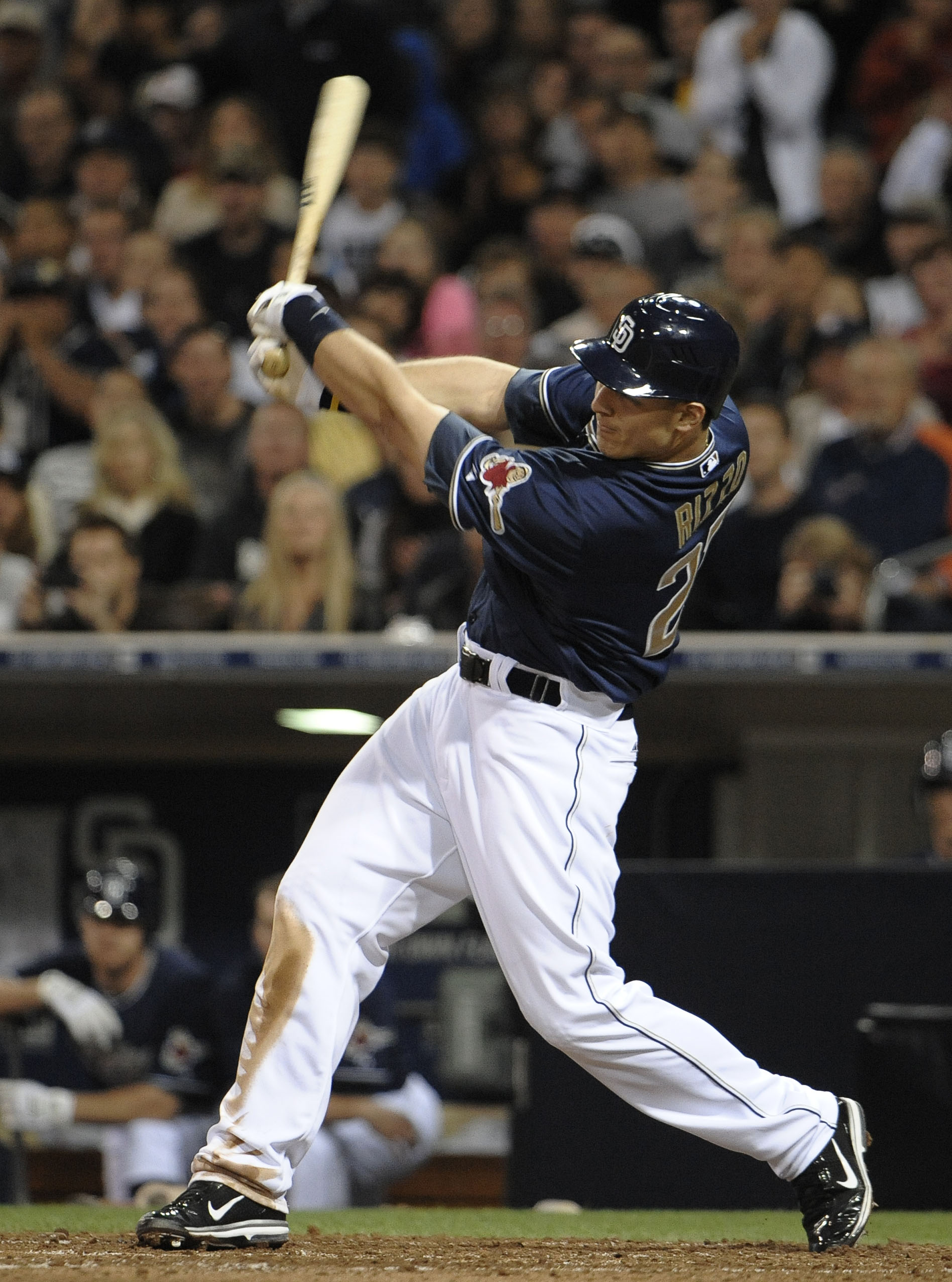 SAN DIEGO, CA - JUNE 10:  Anthony Rizzo #27 of the San Diego Padres swings at a pitch during the sixth inning of a baseball game against the Washington Nationals at Petco Park on June 10, 2011 in San Diego, California. Rizzo struck out in the inning.  (Ph