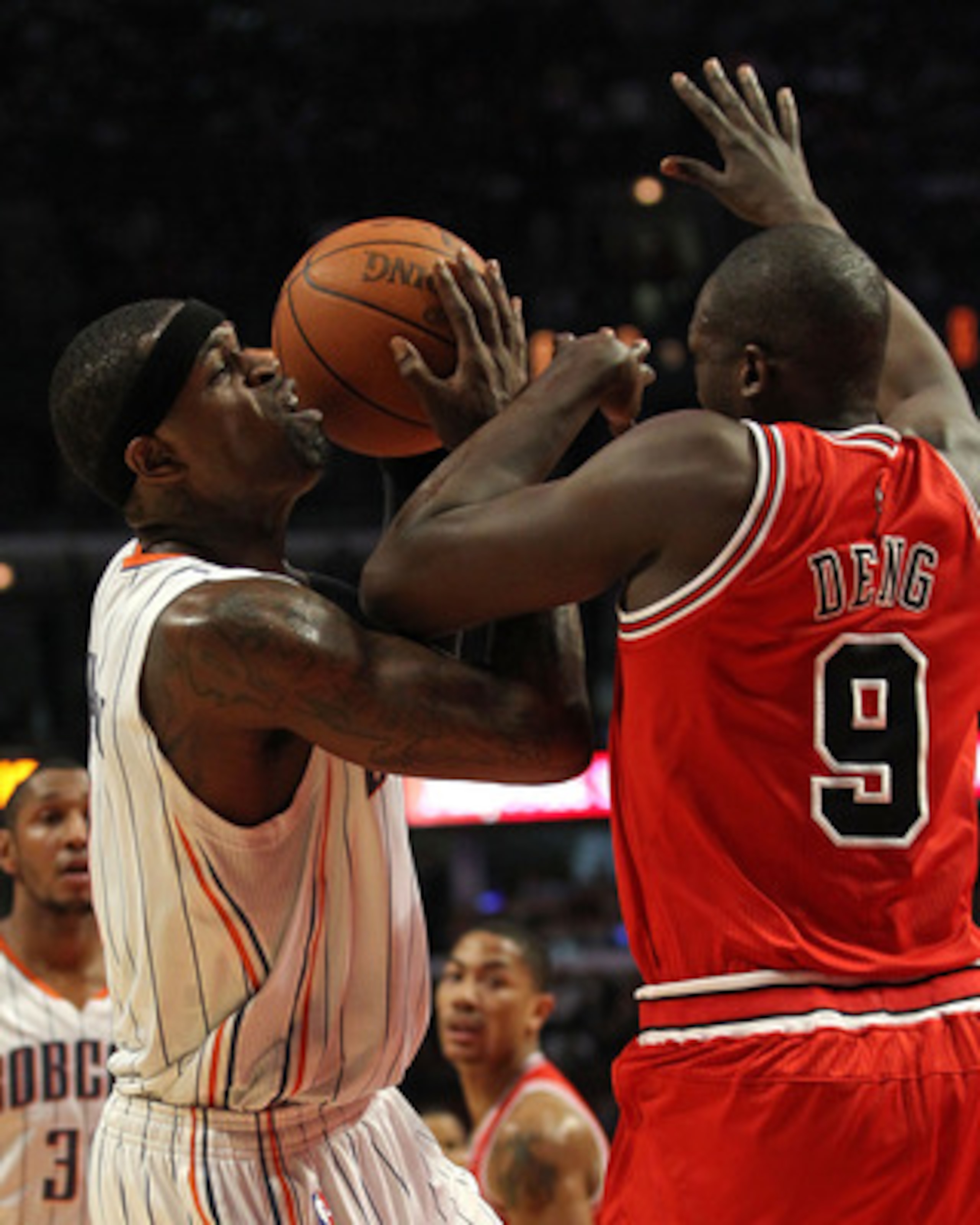 CHICAGO, IL - FEBRUARY 15: Stephen Jackson #1 of the Charlotte Bobcats is fouled by Loul Deng #9 of the Chicago Bulls at the United Center on February 15, 2011 in Chicago, Illinois. NOTE TO USER: User expressly acknowledges and agrees that, by downloading CHICAGO, IL - FEBRUARY 15: Stephen Jackson #1 of the Charlotte Bobcats is fouled by Loul Deng #9 of the Chicago Bulls at the United Center on February 15, 2011 in Chicago, Illinois. NOTE TO USER: User expressly acknowledges and agrees that, by downloading