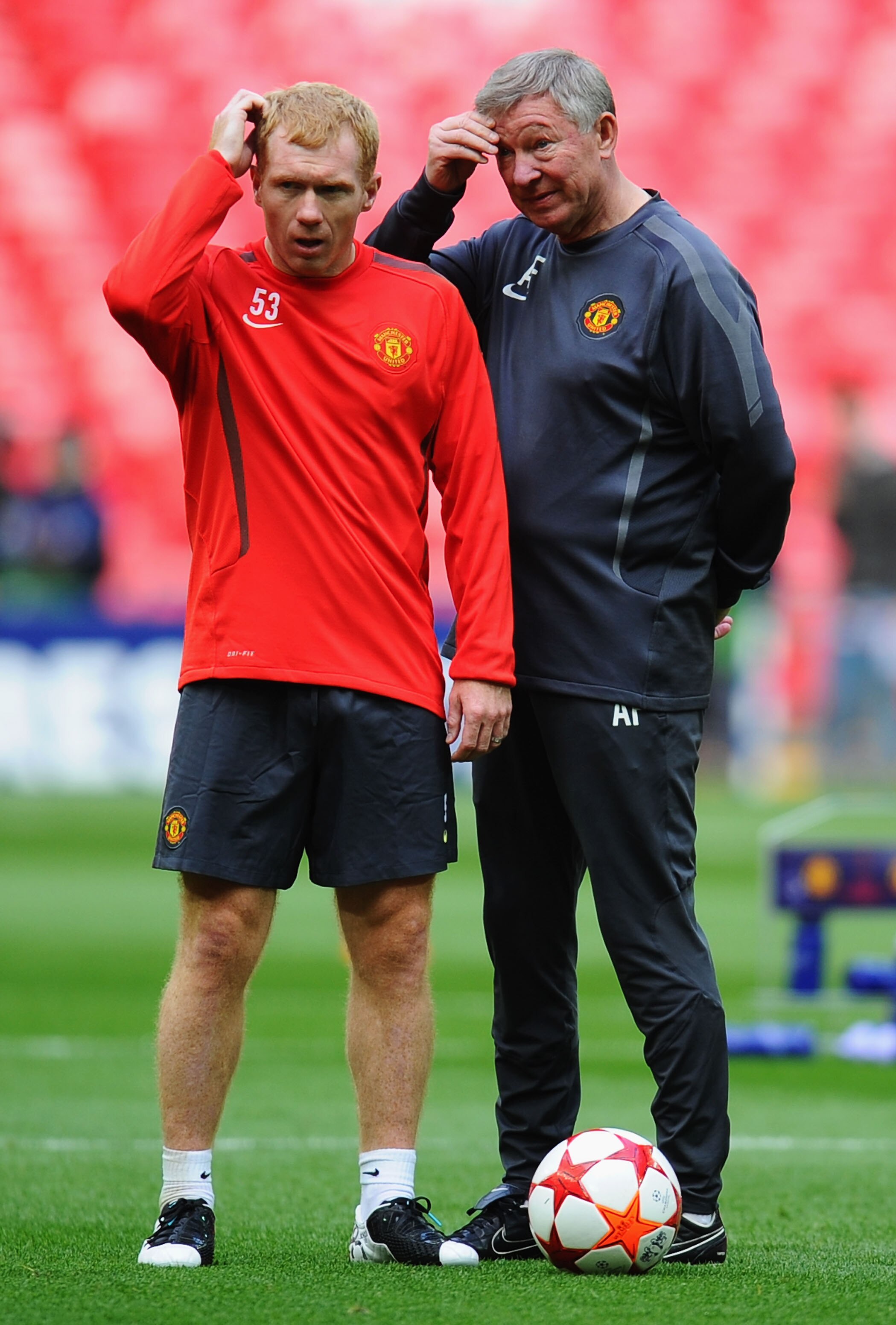LONDON, ENGLAND - MAY 27:  Paul Scholes of Manchester United (L) and Sir Alex Ferguson manager of Manchester United gesture during a Manchester United training session prior to the UEFA Champions League final versus Barcelona at Wembley Stadium on May 27,