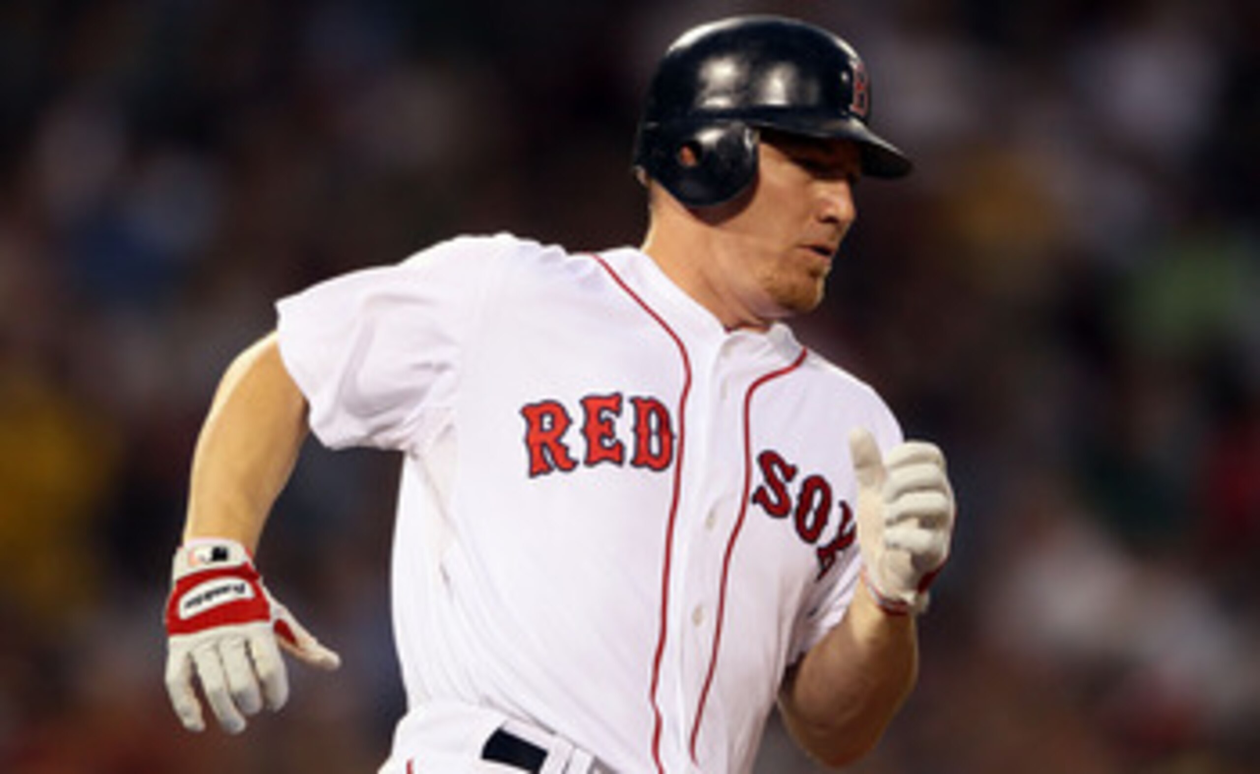 BOSTON - JULY 15:  J.D. Drew #7 of the Boston Red Sox rounds the bases after his solo home run in the fourth inning against the Texas Rangers on July 15, 2010 at Fenway Park in Boston, Massachusetts.  (Photo by Elsa/Getty Images)
