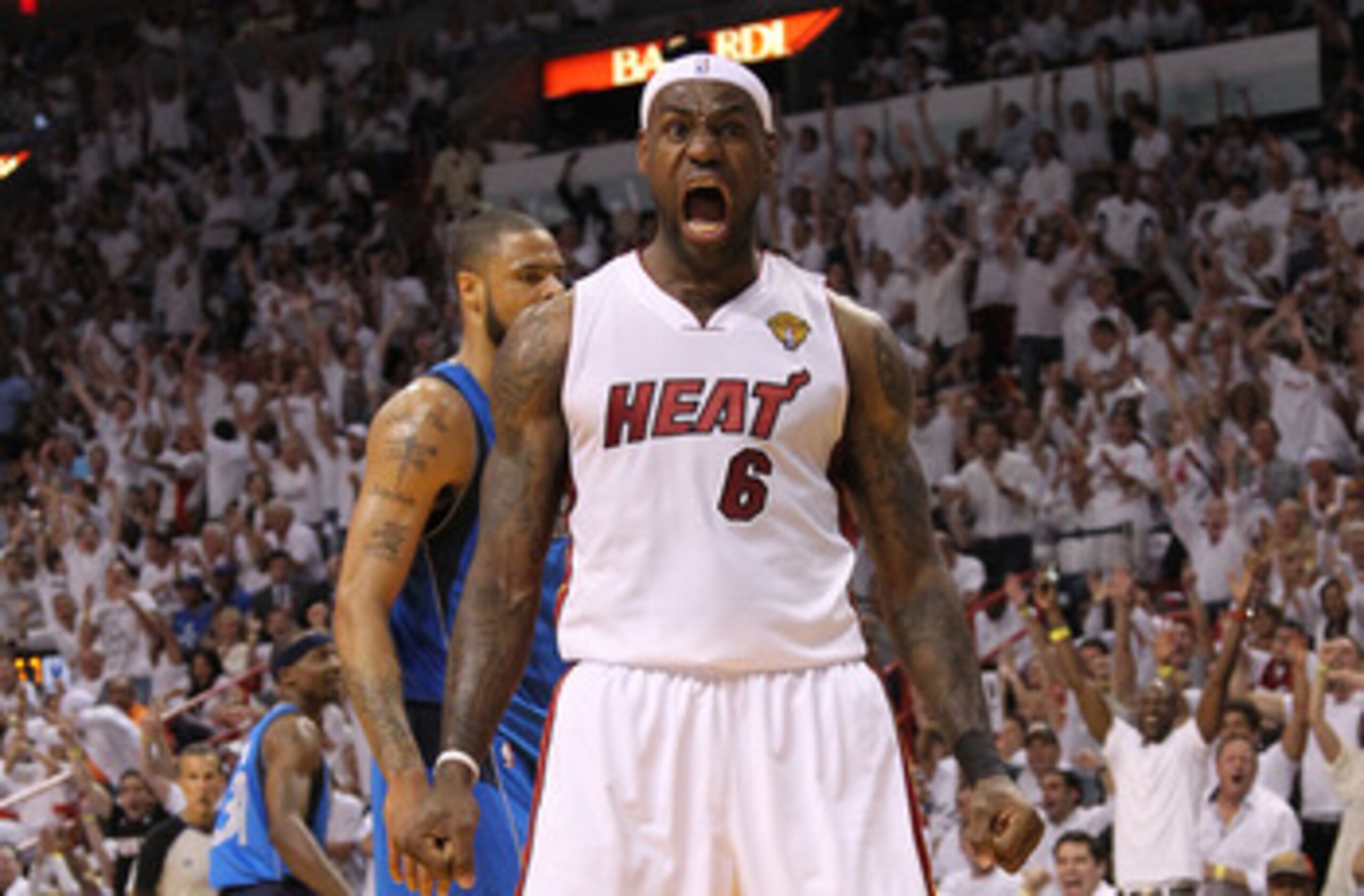 MIAMI, FL - JUNE 02:  LeBron James #6 of the Miami Heat reacts against the Dallas Mavericks in Game Two of the 2011 NBA Finals at American Airlines Arena on June 2, 2011 in Miami, Florida. NOTE TO USER: User expressly acknowledges and agrees that, by down