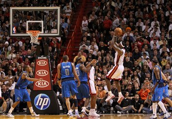 MIAMI, FL - DECEMBER 20:  LeBron James #6 of the Miami Heat shoots a jumpshot during a game against the Dallas Mavericks at American Airlines Arena on December 20, 2010 in Miami, Florida. NOTE TO USER: User expressly acknowledges and agrees that, by downl