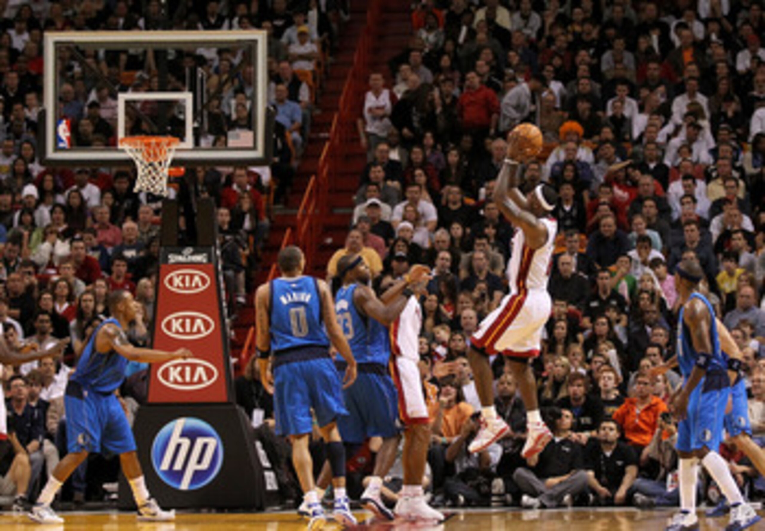 MIAMI, FL - DECEMBER 20:  LeBron James #6 of the Miami Heat shoots a jumpshot during a game against the Dallas Mavericks at American Airlines Arena on December 20, 2010 in Miami, Florida. NOTE TO USER: User expressly acknowledges and agrees that, by downl