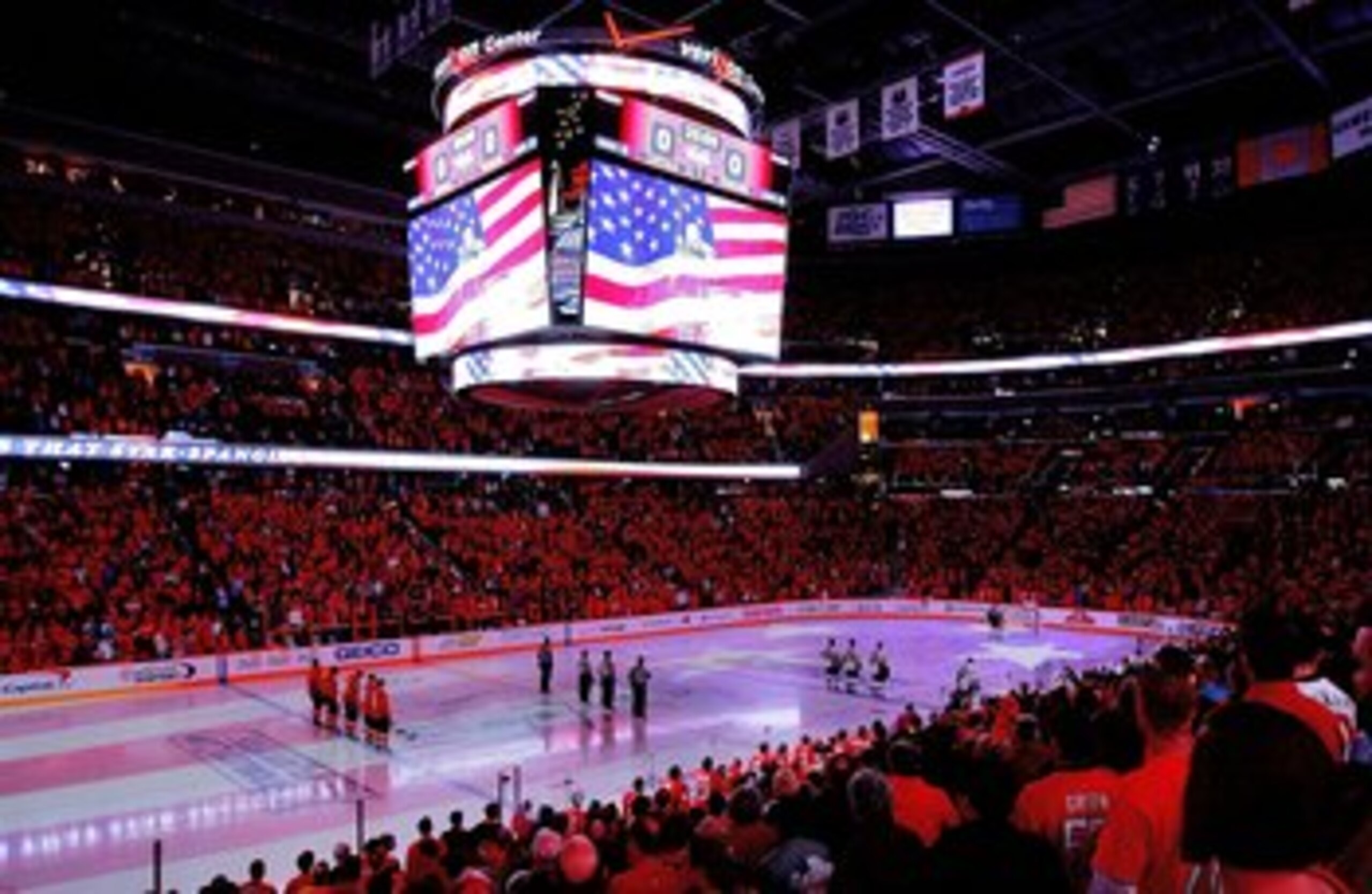 WASHINGTON - MAY 04:  General view of the on ice display of an American Flag during the National Anthem prior to the start of a NHL game between the Washington Capitals and the Pittsburgh Penguins during Game Two of the Eastern Conference Semifinal Round
