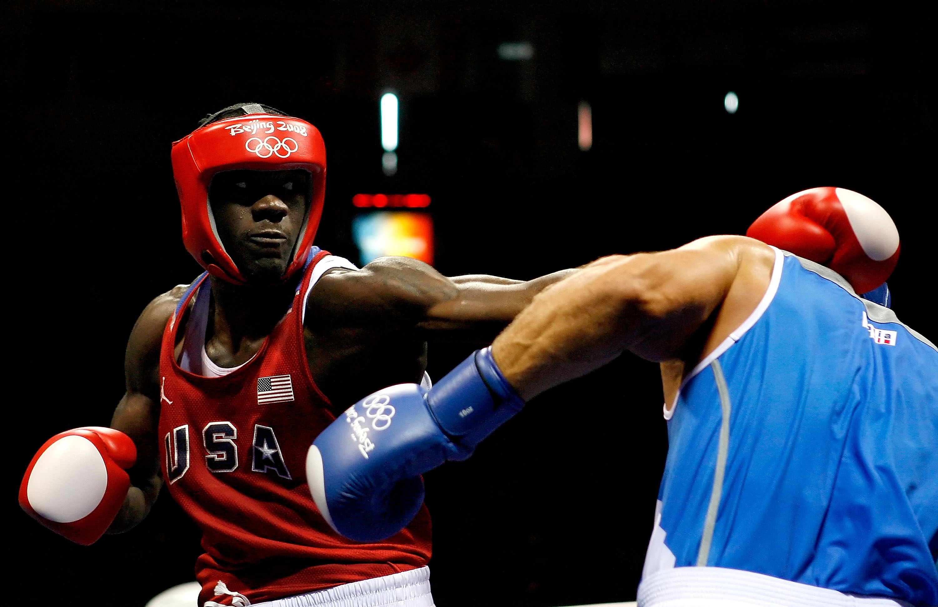 BEIJING - AUGUST 22:  Clemente Russo of Italy (blue) fights Deontay Wilder of the United States (red) in the Men's Heavy (91kg) Semifinal at the Workers' Indoor Arena on Day 14 of the Beijing 2008 Olympic Games on August 22, 2008 in Beijing, China. Russo
