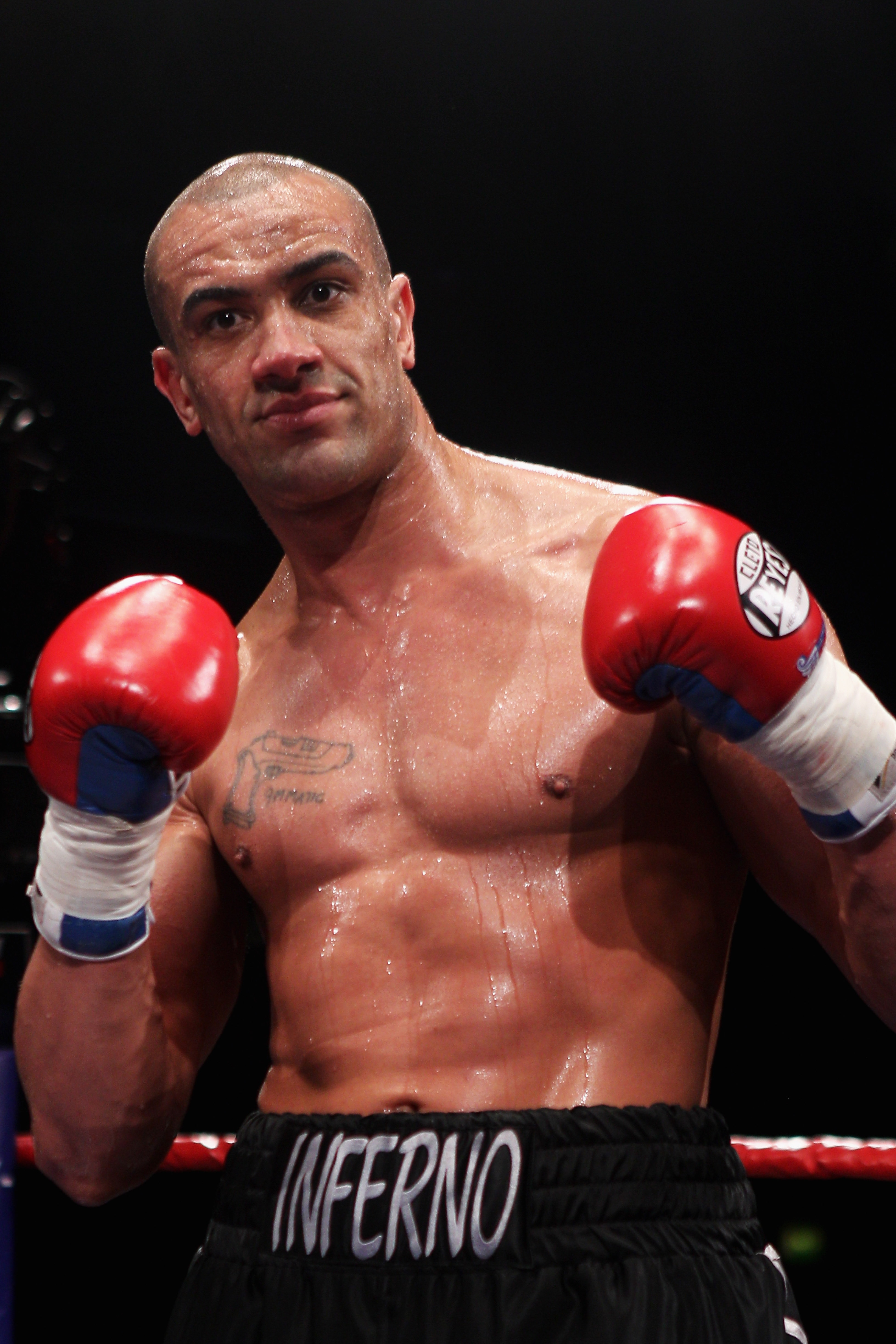 BOLTON, ENGLAND - FEBRUARY 26:  Richard Towers of England celebrates victory over Daniel Bispo of Brazil in their Heavyweight fight during the Night of Champions Boxing at Reebok Stadium on February 26, 2011 in Bolton, England.  (Photo by Dean Mouhtaropou