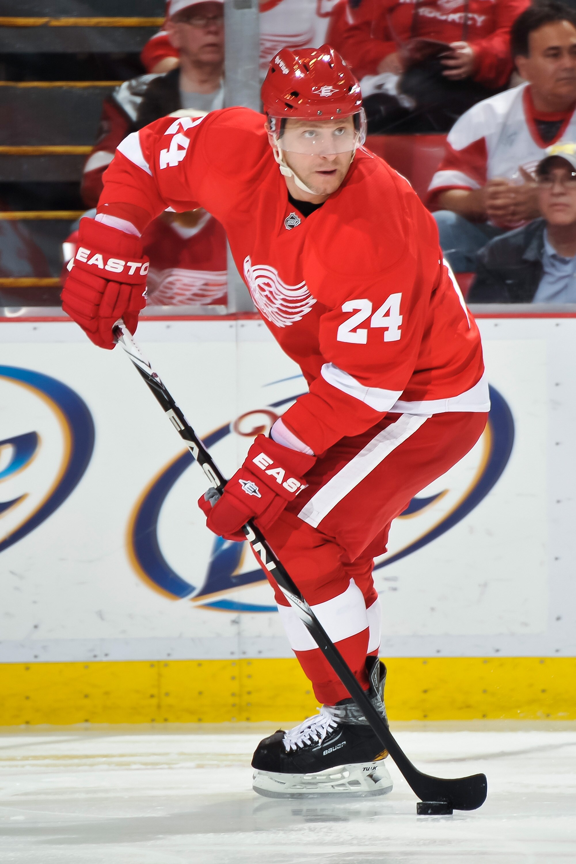DETROIT - MAY 4: Ruslan Salei #24 of the Detroit Red Wings skates with the puck against the San Jose Sharks in Game Three of the Western Conference Semifinals during the 2011 NHL Stanley Cup Playoffs on May 4, 2011 at Joe Louis Arena in Detroit, Michigan.