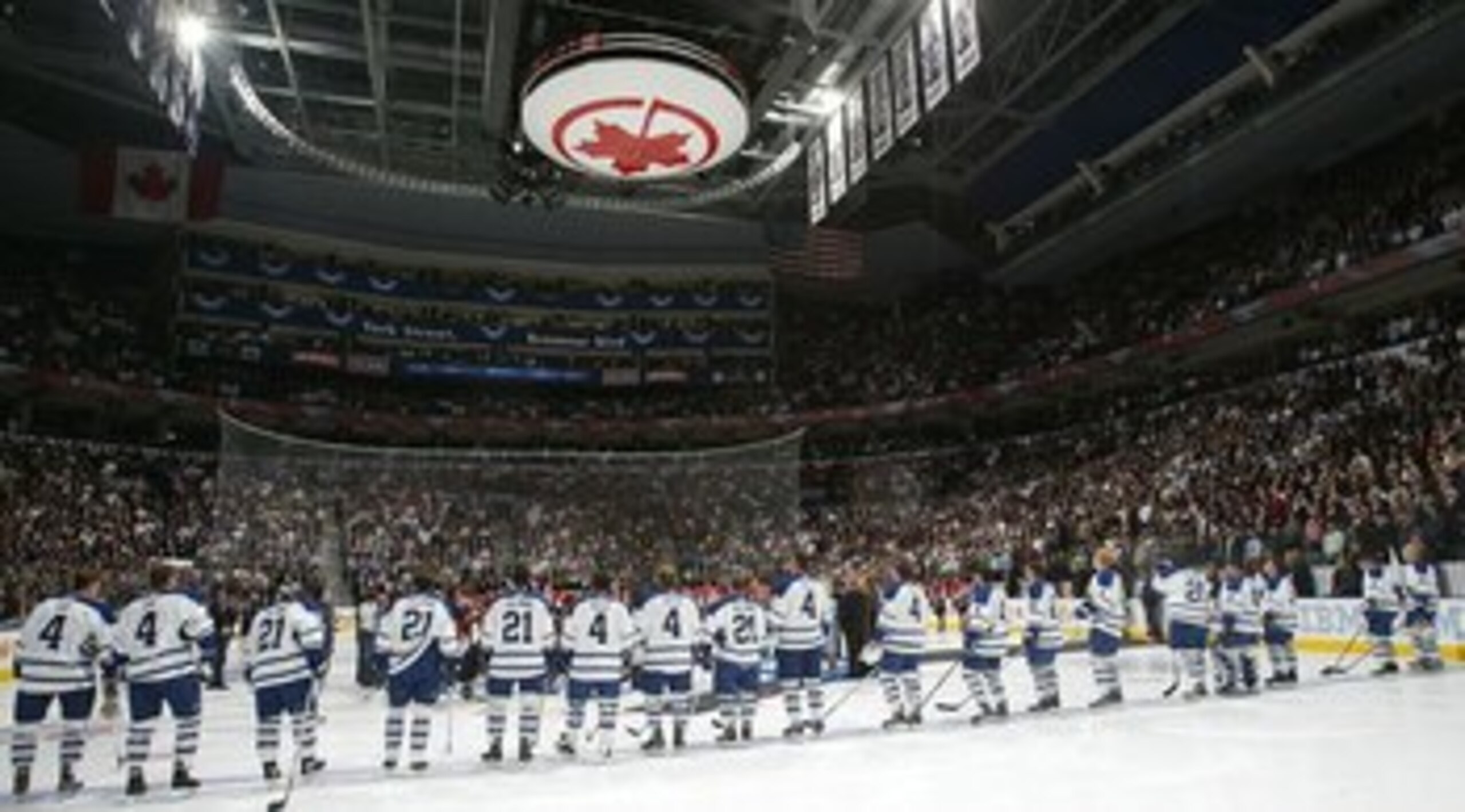 TORONTO - OCTOBER 4:  Too celebrate the achievements of three former Toronto Maple Leafs players, Leonard 'Red' Kelly, Clarence 'Hap' Day, and Borje Salming, members of  the Toronto Maple Leafs wear their numbers on their jerseys prior to the raising of t