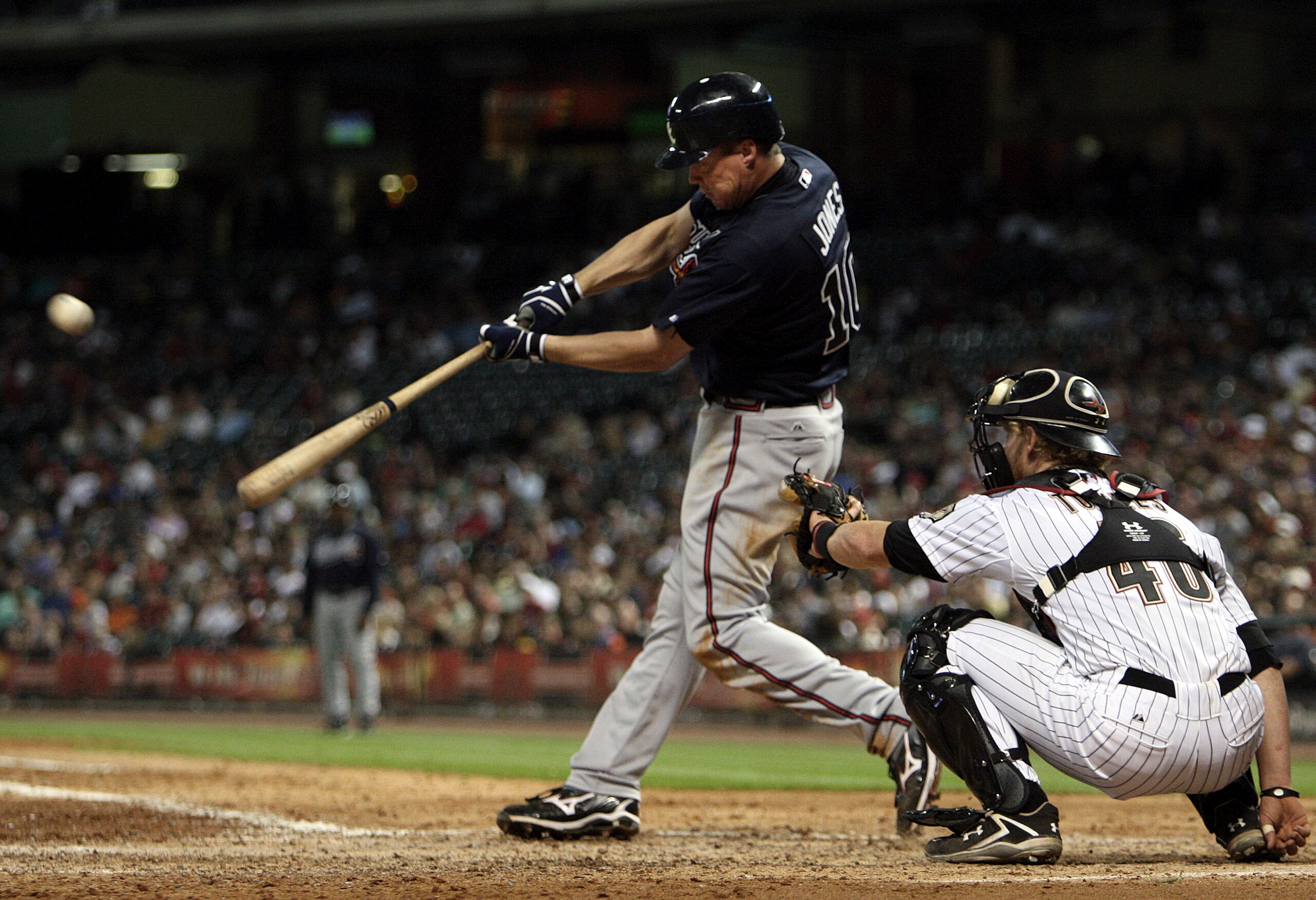 HOUSTON - JUNE 10: Chipper Jones #10 of the Atlanta Braves hits a home run in the eighth inning against the Houston Astros at Minute Maid Park on June 10, 2011 in Houston, Texas. (Photo by Bob Levey/Getty Images) HOUSTON - JUNE 10: Chipper Jones #10 of the Atlanta Braves hits a home run in the eighth inning against the Houston Astros at Minute Maid Park on June 10, 2011 in Houston, Texas. (Photo by Bob Levey/Getty Images)
