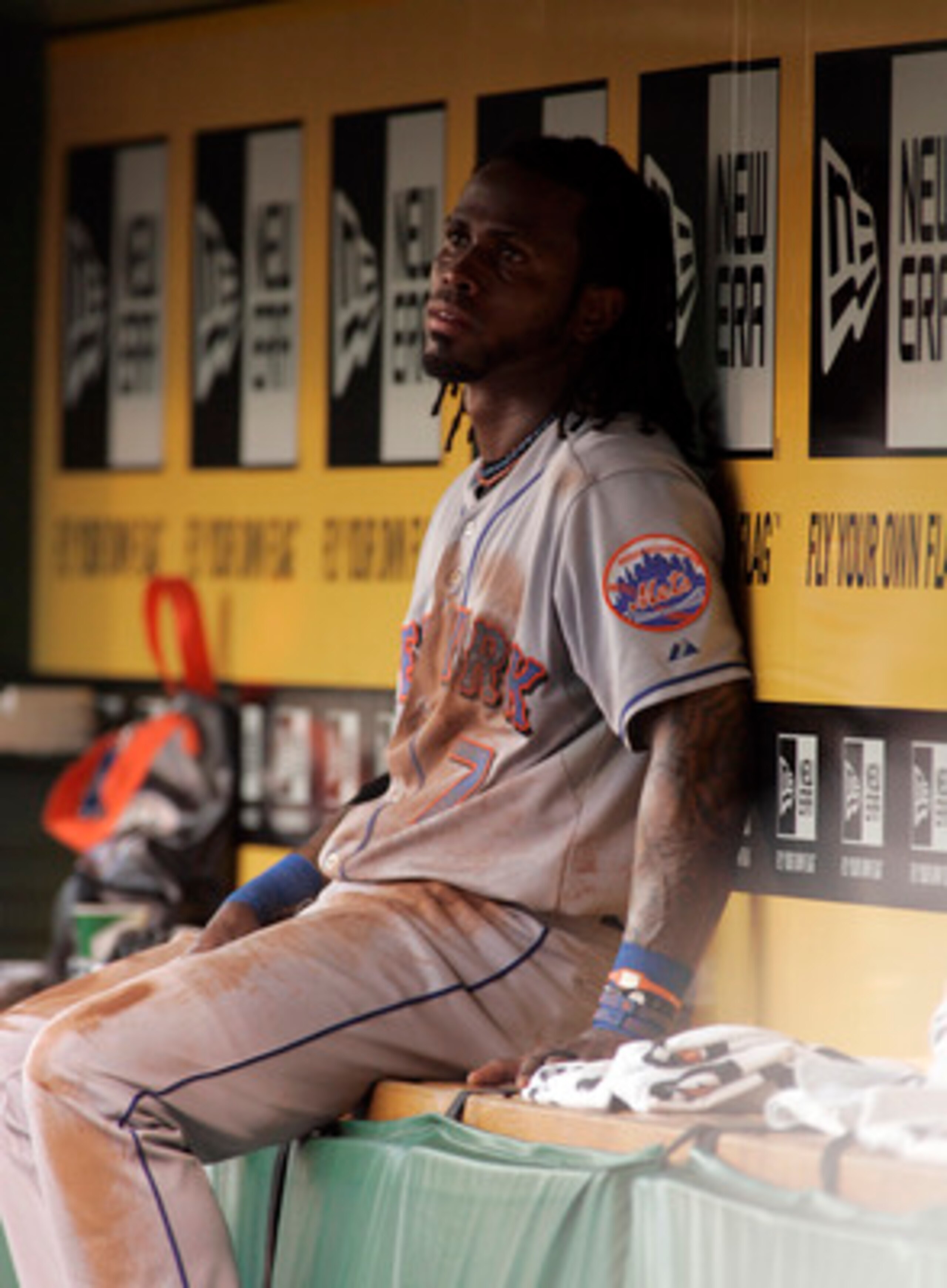 PITTSBURGH, PA - JUNE 11:  Jose Reyes #7 of the New York Mets looks on from the dugout against the Pittsburgh Pirates during the game on June 11, 2011 at PNC Park in Pittsburgh, Pennsylvania.  (Photo by Justin K. Aller/Getty Images)