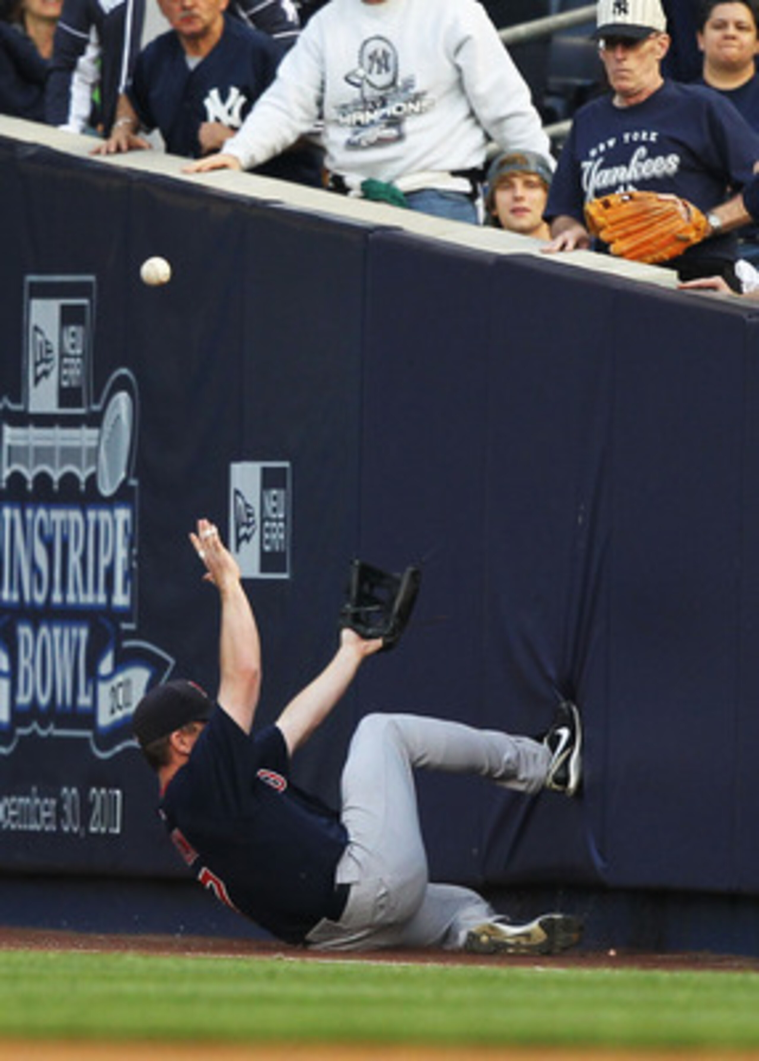 NEW YORK, NY - MAY 13:  J.D. Drew #7 of the Boston Red Sox cannot catch a foul ball hit  by Curtis Granderson #14 of the New York Yankees during their game on May 13, 2011 at Yankee Stadium in the Bronx borough of New York City.  (Photo by Al Bello/Getty 