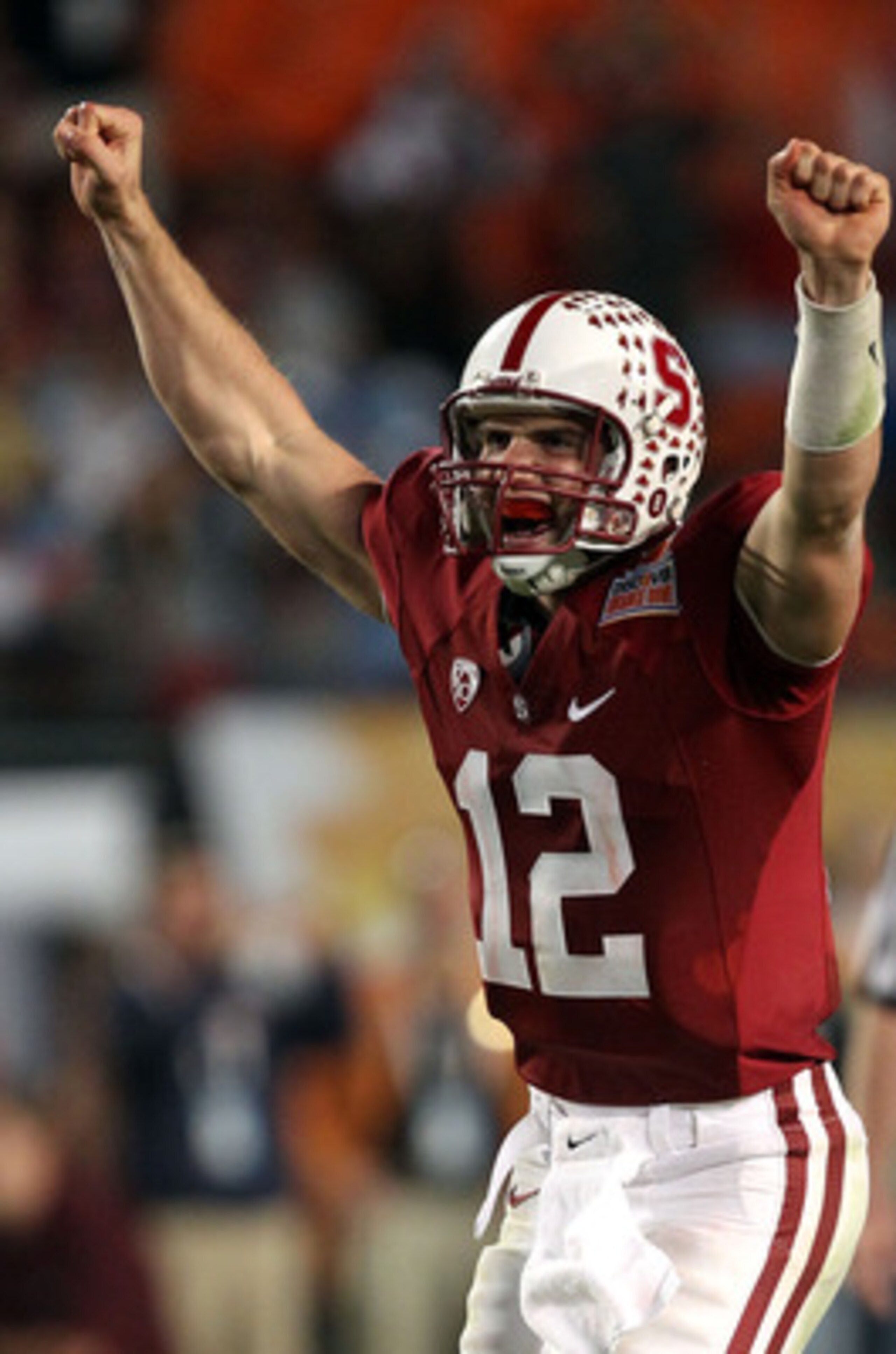 MIAMI, FL - JANUARY 03:  Andrew Luck #12 of the Stanford Cardinal celebrates after he threw a 38-yard touchdown pass in the fourth quarter against the Virginai Tech Hokies during the 2011 Discover Orange Bowl at Sun Life Stadium on January 3, 2011 in Miam