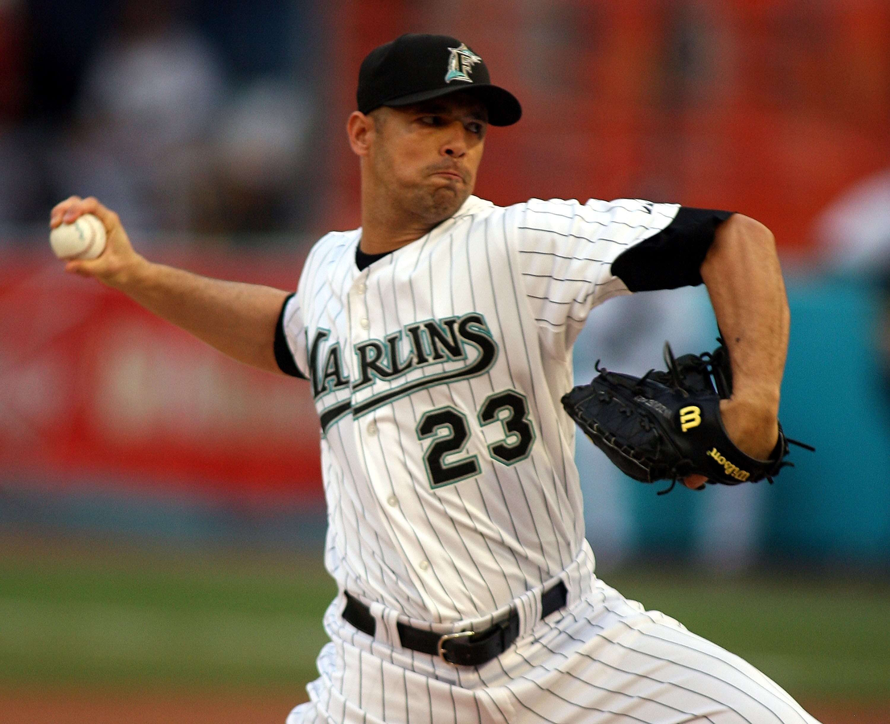 MIAMI GARDENS, FL - JUNE 11:  Pitcher Javier Vazquez #23 of the Florida Marlins hits pitches against the Arizona Diamondbacks at Sun Life Stadium on June 11, 2011 in Miami Gardens, Florida.  (Photo by Marc Serota/Getty Images)