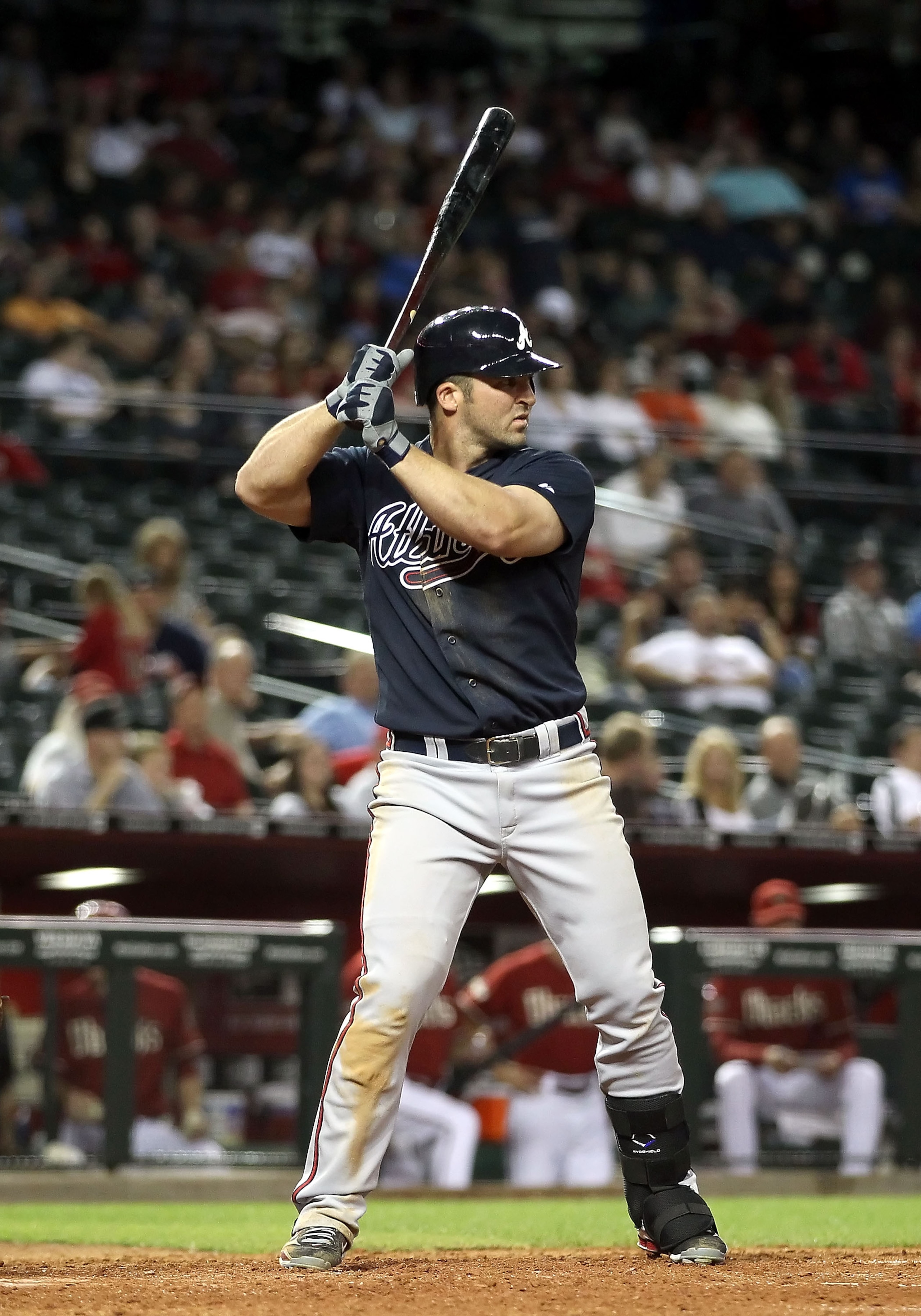 PHOENIX, AZ - MAY 18:  Dan Uggla #26 of the Atlanta Braves bats against the Arizona Diamondbacks during the Major League Baseball game at Chase Field on May 18, 2011 in Phoenix, Arizona.  The Diamondbacks defeated the Braves 5-4 in eleven innings.  (Photo