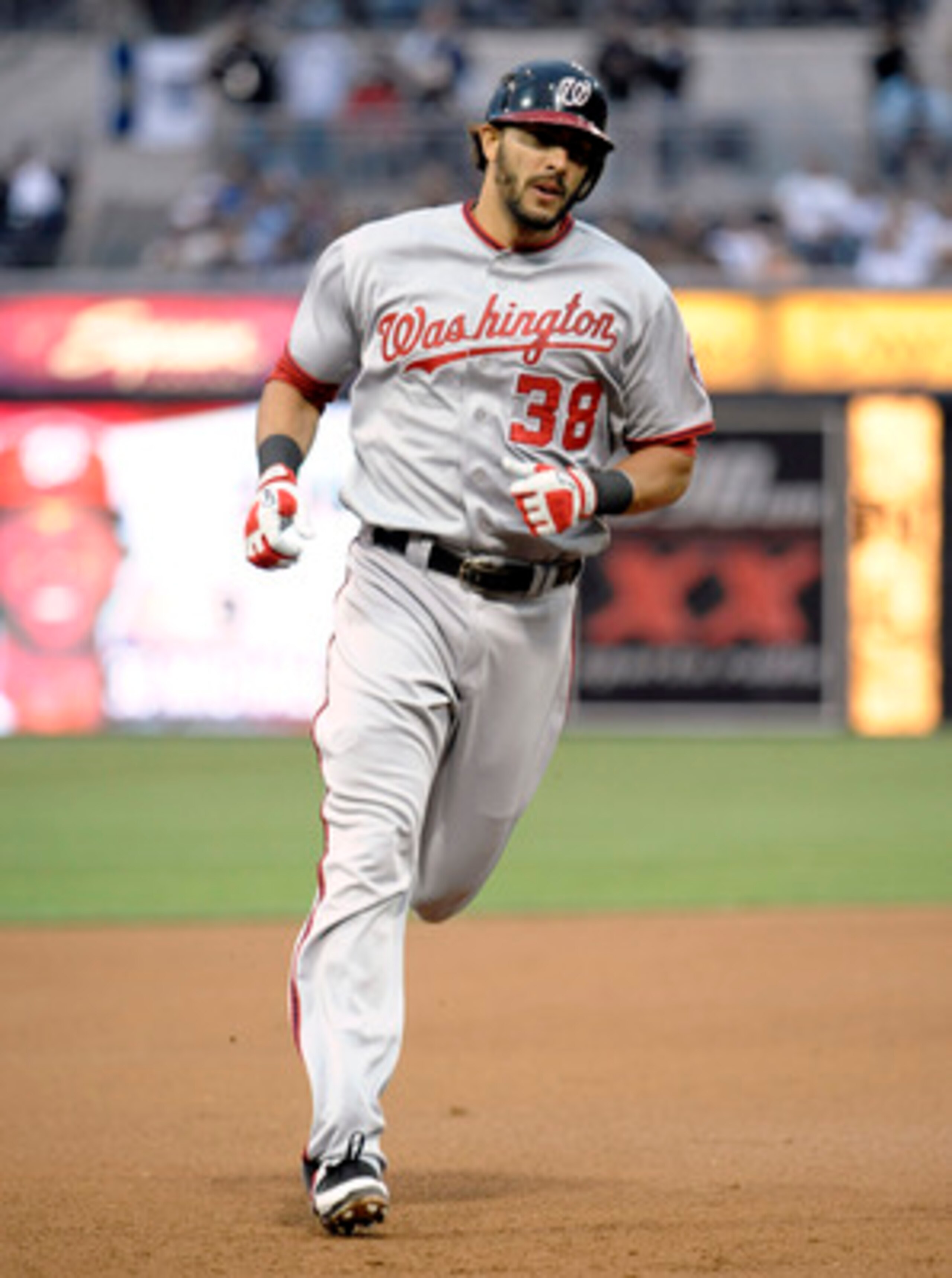 SAN DIEGO, CA - JUNE 10:  Michael Morse #38 of the Washington Nationals rounds the bases after hitting a two-run homer hits during the second inning of a baseball game against the San Diego Padres at Petco Park on June 10, 2011 in San Diego, California.