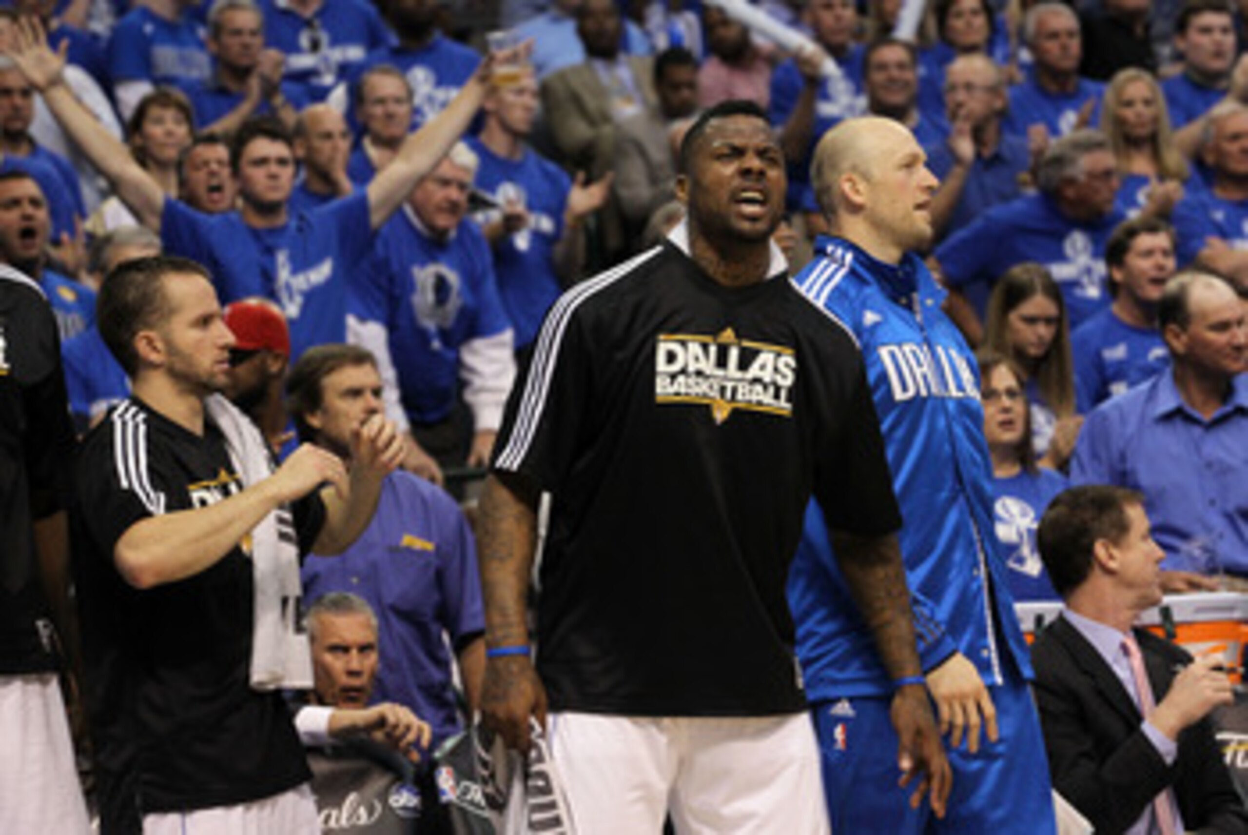 DALLAS, TX - JUNE 09:  Jose Juan Barea #11, DeShawn Stevenson #92 and Brian Cardinal #35 of the Dallas Mavericks react from the bench against the Miami Heat in the first half of Game Five of the 2011 NBA Finals at American Airlines Center on June 9, 2011