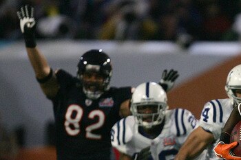 MIAMI GARDENS, FL - FEBRUARY 04:  Kick returner Devin Hester #23 of the Chicago Bears returns the opening kickoff 92-yards for a touchdown past a diving Adam Vinatieri #4 of the Indianapolis Colts in the first quarter of Super Bowl XLI on February 4, 2007