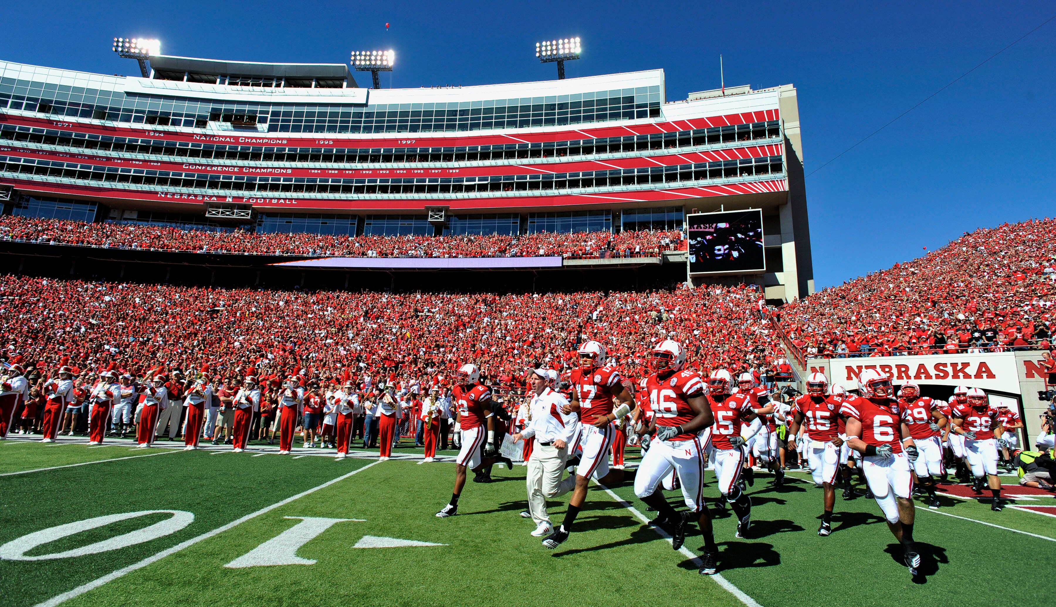 LINCOLN, NE - SEPTEMBER 11: Nebraska Cornhuskers HEad Coach Bo Pelini (center) leads his team onto the field before their game against the Udaho Vandals at Memorial Stadium on September 4, 2010 in Lincoln, Nebraska. Nebraska Defeated Idaho 38-17. (Photo b