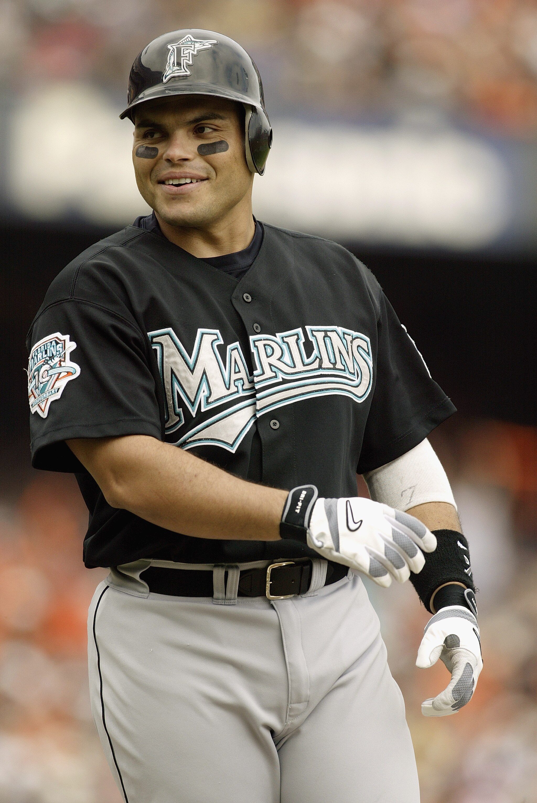 SAN FRANCISCO - OCTOBER 1:  Catcher Ivan Rodriguez #7 of the Florida Marlins smiles during Game 2 of the 2003 National League Division Series against the San Francisco Giants at Pacific Bell Park on October 1, 2003 in San Francisco, California.  The Marli
