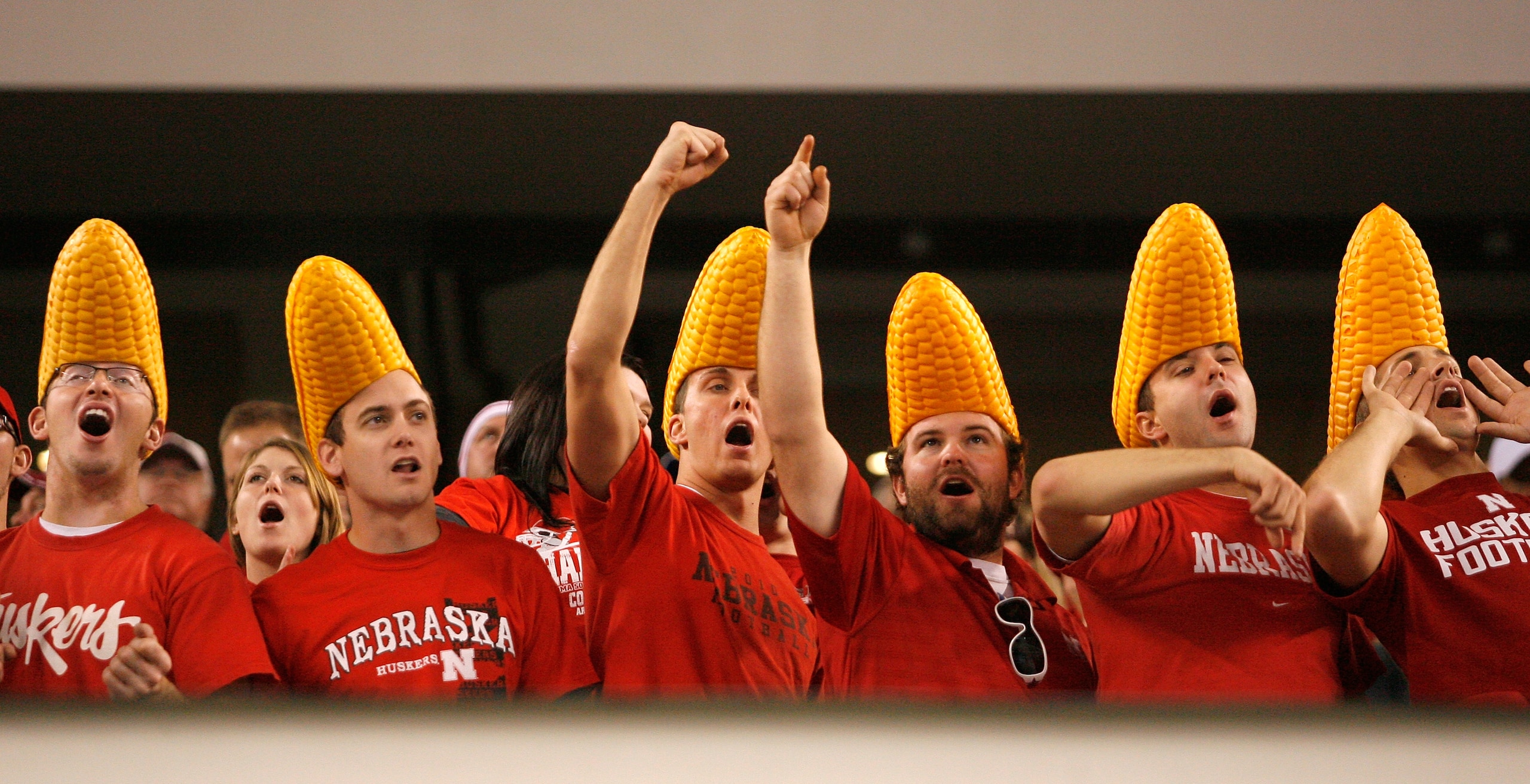 ARLINGTON, TX - DECEMBER 04: Nebraska Cornhusker fans cheer on their team against the Oklahoma Sooners at Cowboys Stadium on December 4, 2010 in Arlington, Texas. The Sooners beat the Cornhuskers 23-20. (Photo by Tom Pennington/Getty Images) ARLINGTON, TX - DECEMBER 04: Nebraska Cornhusker fans cheer on their team against the Oklahoma Sooners at Cowboys Stadium on December 4, 2010 in Arlington, Texas. The Sooners beat the Cornhuskers 23-20. (Photo by Tom Pennington/Getty Images)
