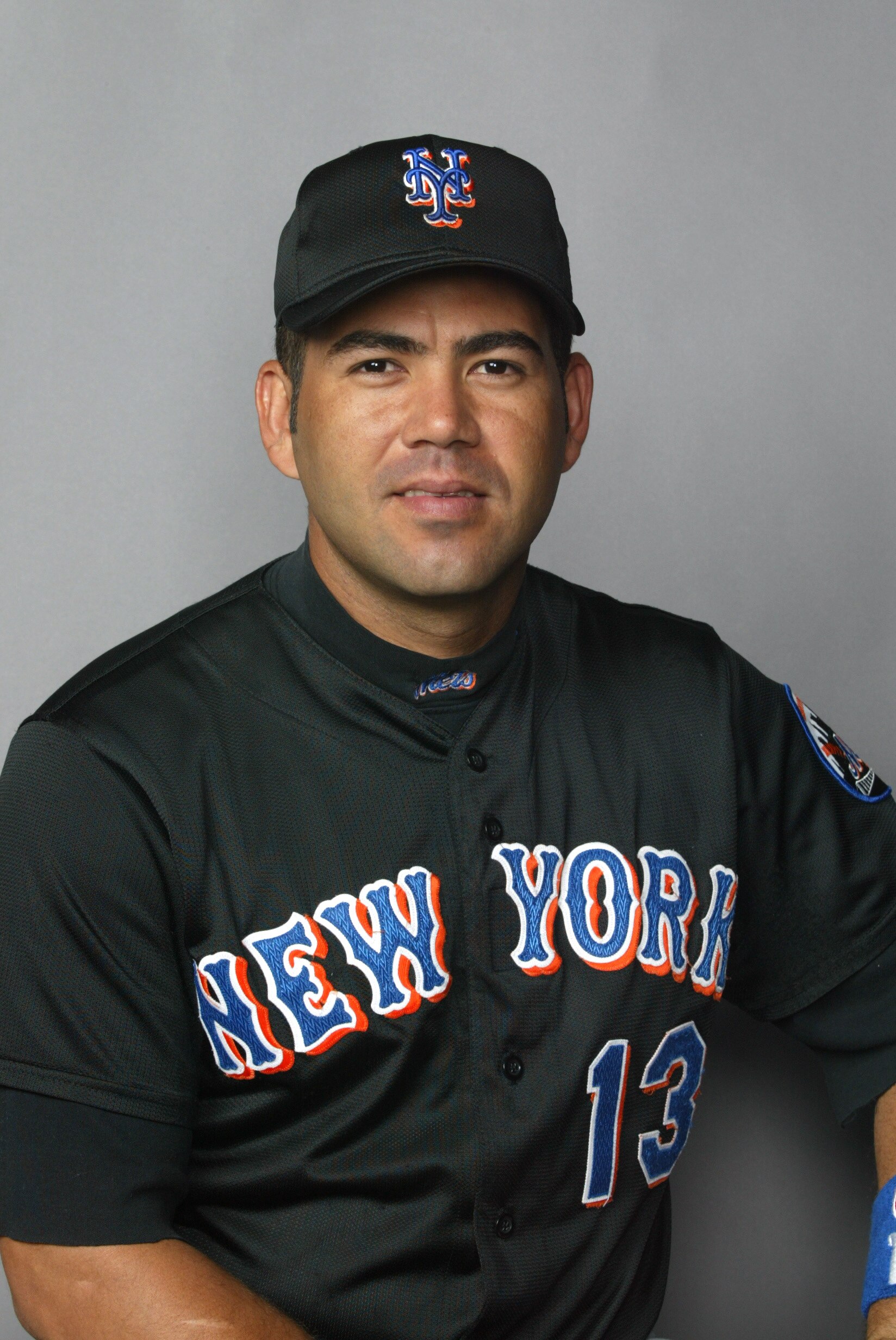 25 Feb 2002: Edgardo Alfonzo # 13 of the New York Mets posses for Spring Training Picture Day at Thomas J. White Stadium in Port St. Lucie Florida. DIGITAL IMAGE. Mandatory Credit: Eliot Schechter/Getty Images