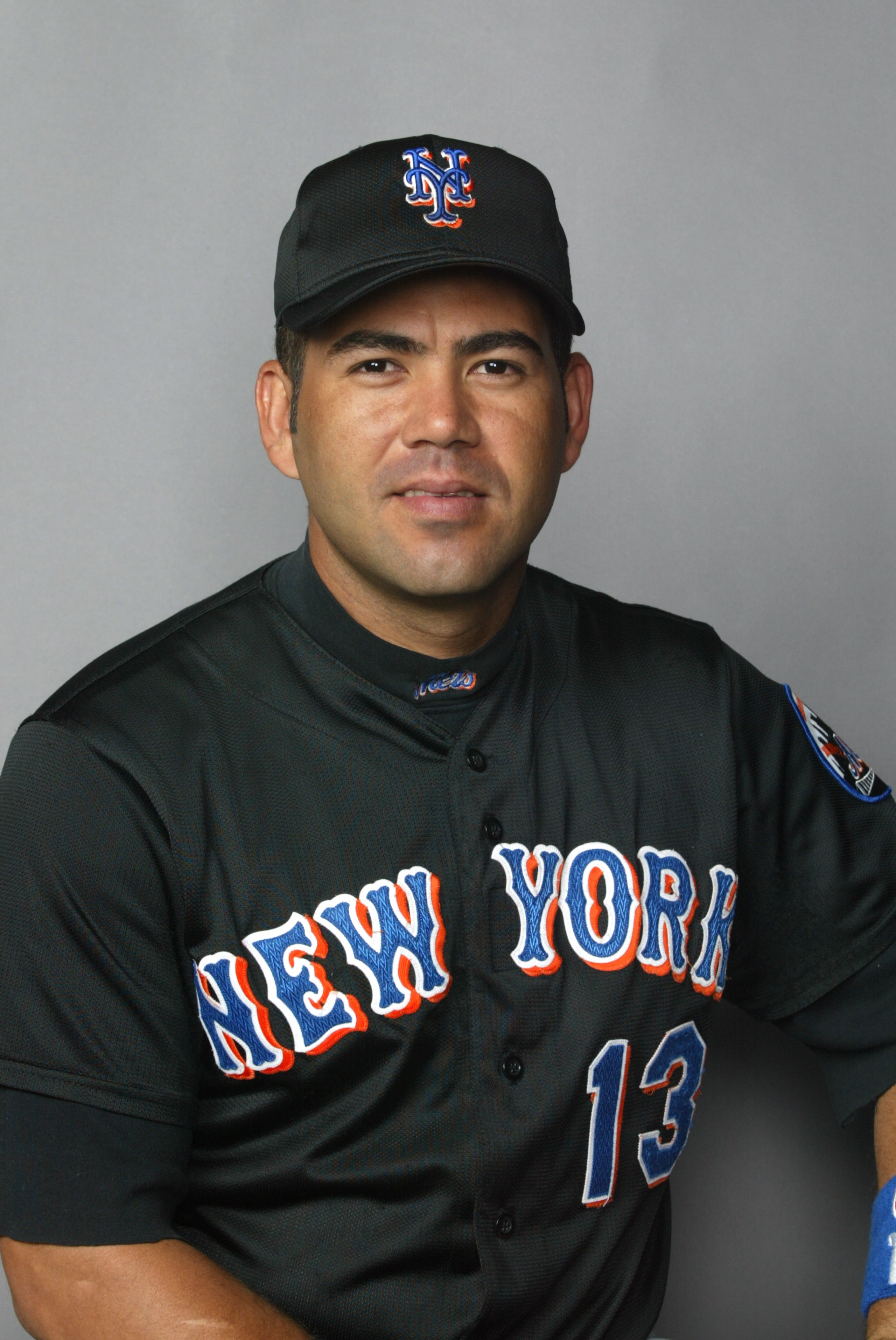 25 Feb 2002: Edgardo Alfonzo # 13 of the New York Mets posses for Spring Training Picture Day at Thomas J. White Stadium in Port St. Lucie Florida. DIGITAL IMAGE. Mandatory Credit: Eliot Schechter/Getty Images