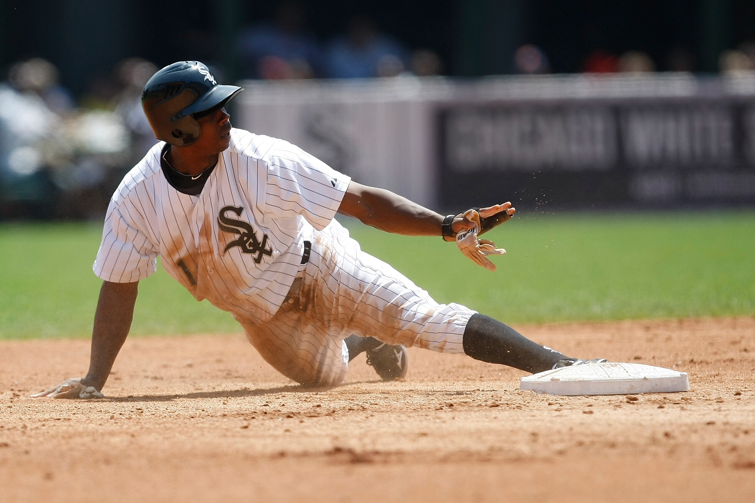 CHICAGO, IL- JUNE 5: Juan Pierre #1 of the Chicago White Sox slides against The Detroit Tigers at U.S. Cellular Field on June 5, 2011 in Chicago, Illinois. The Tigers defeated the White Sox 7-3. (Photo by Scott Boehm/Getty Images)