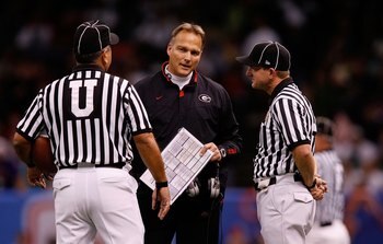 NEW ORLEANS - JANUARY 01:  Head coach Mark Richt of the Georgia Bulldogs talks with officials against the Hawai'i Warriors during the Allstate Sugar Bowl at the Louisiana Superdome on January 1, 2008 in New Orleans, Louisiana.  (Photo by Chris Graythen/Ge