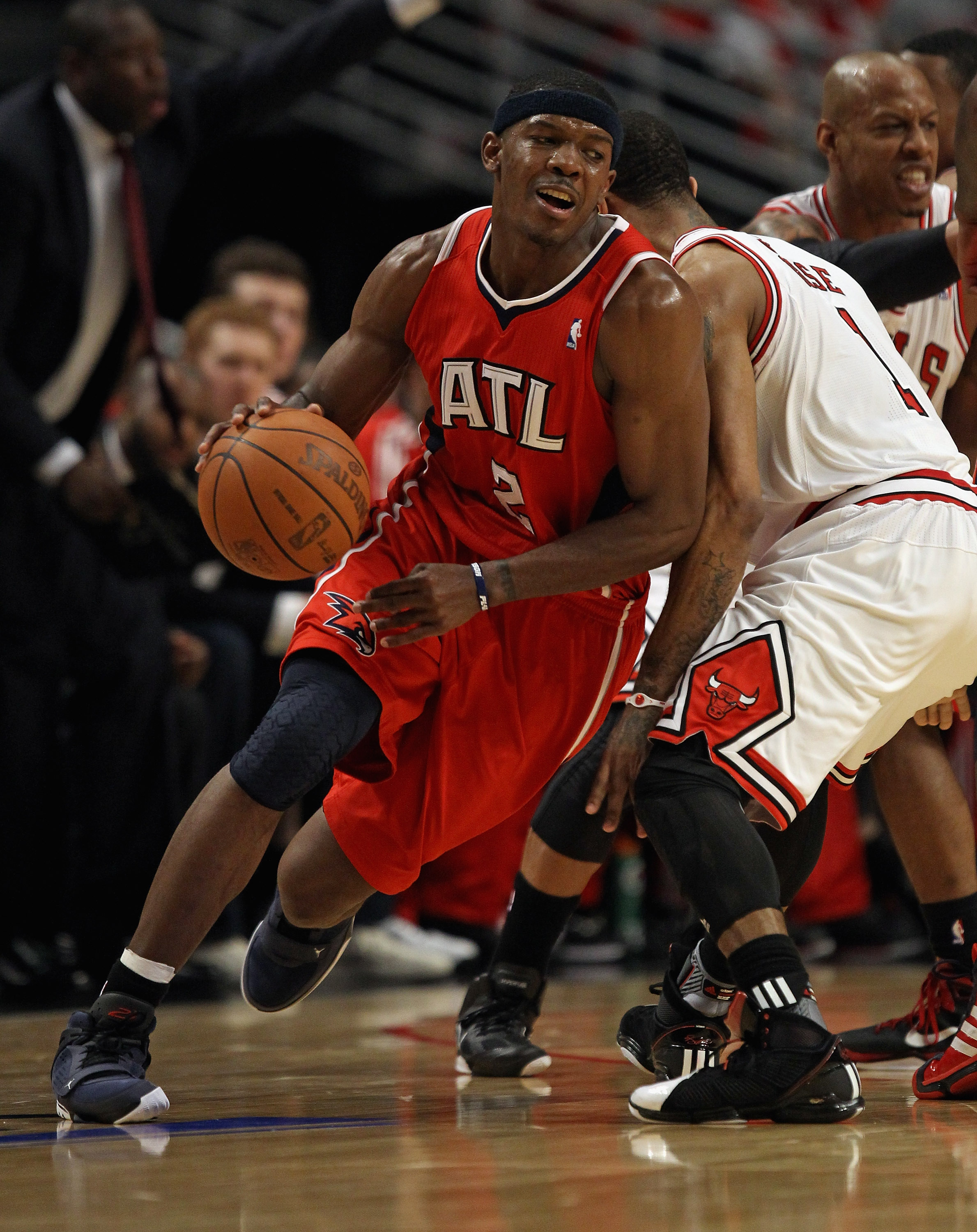 CHICAGO, IL - MAY 10: Joe Johnson #2 of the Atlanta Hawks moves around Derrick Rose #1 of the Chicago Bulls in Game Five of the Eastern Conference Semifinals in the 2011 NBA Playoffs at the United Center on May 10, 2011 in Chicago, Illinois. The Bulls def