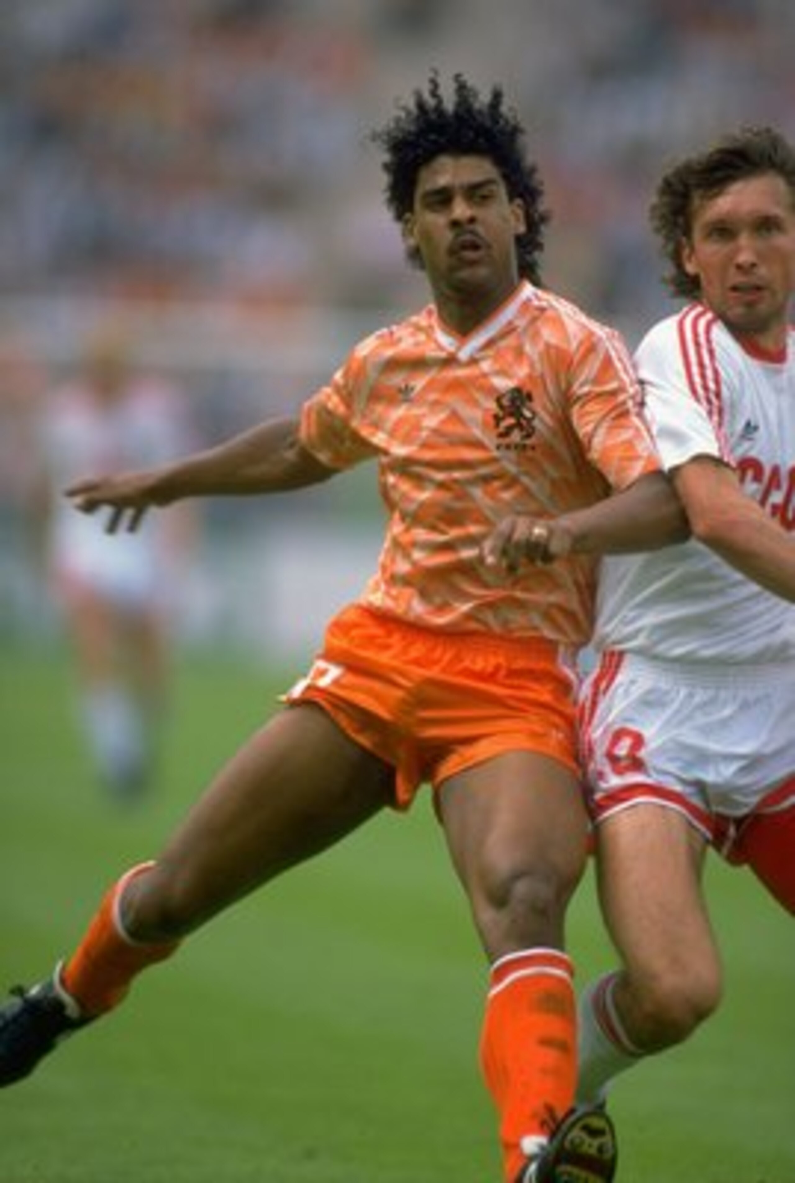25 Jun 1988:  Frank Rijkaard of Holland battles with Oleg Protasov of the Soviet Union in action during the European Championship Final at the Olympic Stadium in Munich, West Germany. Holland won the match 2-0.  \ Mandatory Credit: David Cannon /Allsport