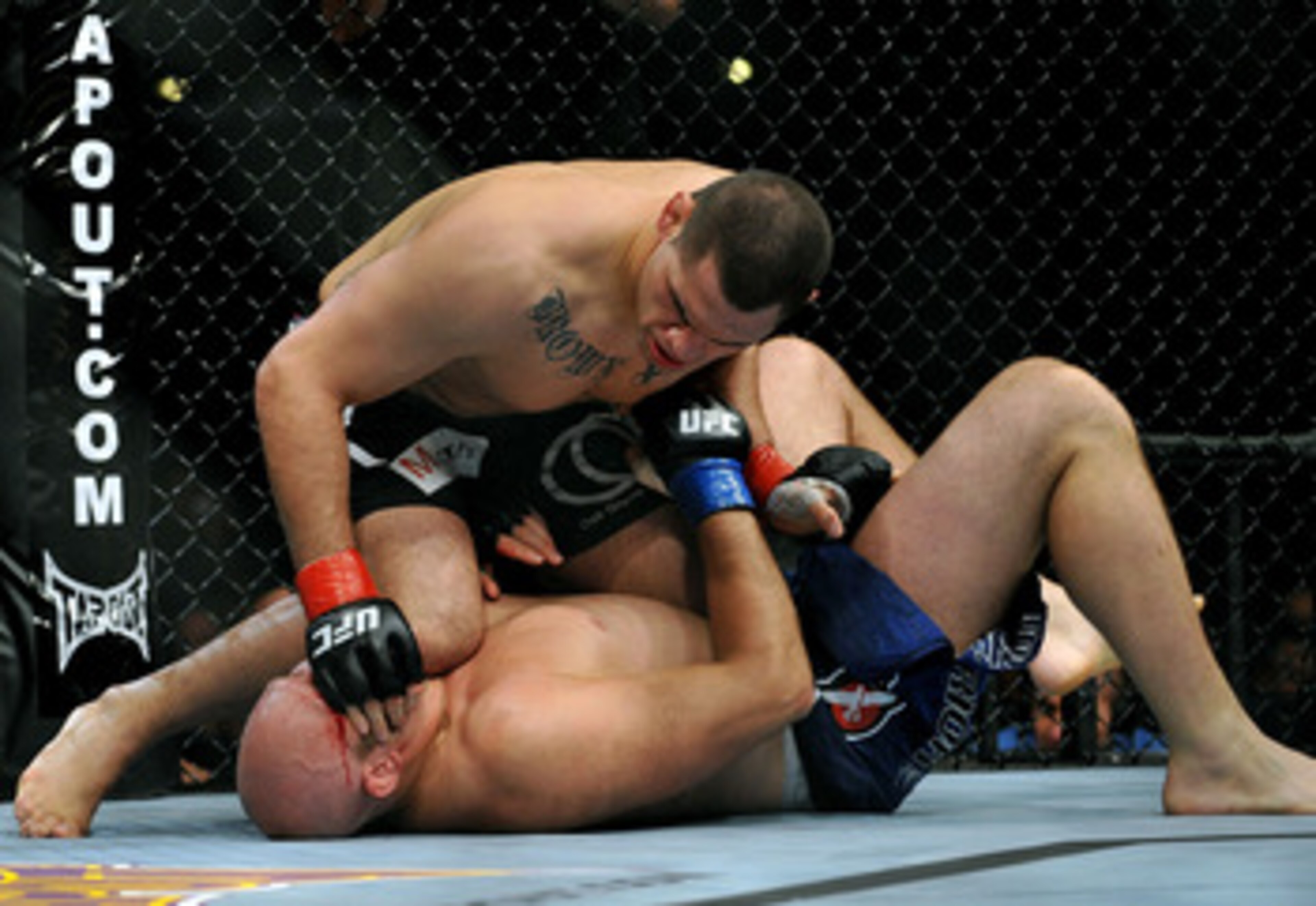 LOS ANGELES, CA - OCTOBER 24: UFC fighter Cain Velasquez (top) battles with UFC fighter Ben Rothwell (bottom) during their Heavyweight bout at UFC 104: Machida vs. Shogun at Staples Center on October 24, 2009 in Los Angeles, California. (Photo by Jon Ko LOS ANGELES, CA - OCTOBER 24: UFC fighter Cain Velasquez (top) battles with UFC fighter Ben Rothwell (bottom) during their Heavyweight bout at UFC 104: Machida vs. Shogun at Staples Center on October 24, 2009 in Los Angeles, California. (Photo by Jon Ko