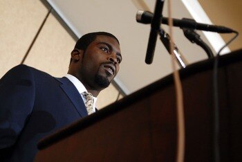 RICHMOND, VA - AUGUST 27:  Atlanta Falcons quarterback Michael Vick speaks to reporters at the Omni Richmond Hotel after agreeing to a guilty plea on charges stemming from his involvement in a dogfighting ring August 27, 2007, in Richmond, Virginia.  (Pho