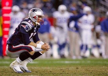 FOXBORO, MA - NOVEMBER 07:  Quarterback Tom Brady #12 of the New England Patriots sits dejected on the field after their 40-21 loss to the Indianapolis Colts at Gillette Stadium on November 7, 2005 in Foxboro, Massachusetts.  (Photo by Nick Laham/Getty Im