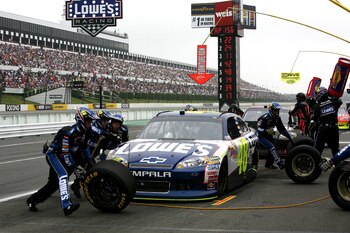 LONG POND, PA - JUNE 12:  Jimmie Johnson, driver of the #48 Lowe's Chevrolet, pits during the NASCAR Sprint Cup Series 5-Hour Energy 500 at Pocono Raceway on June 12, 2011 in Long Pond, Pennsylvania.  (Photo by Jerry Markland/Getty Images for NASCAR)