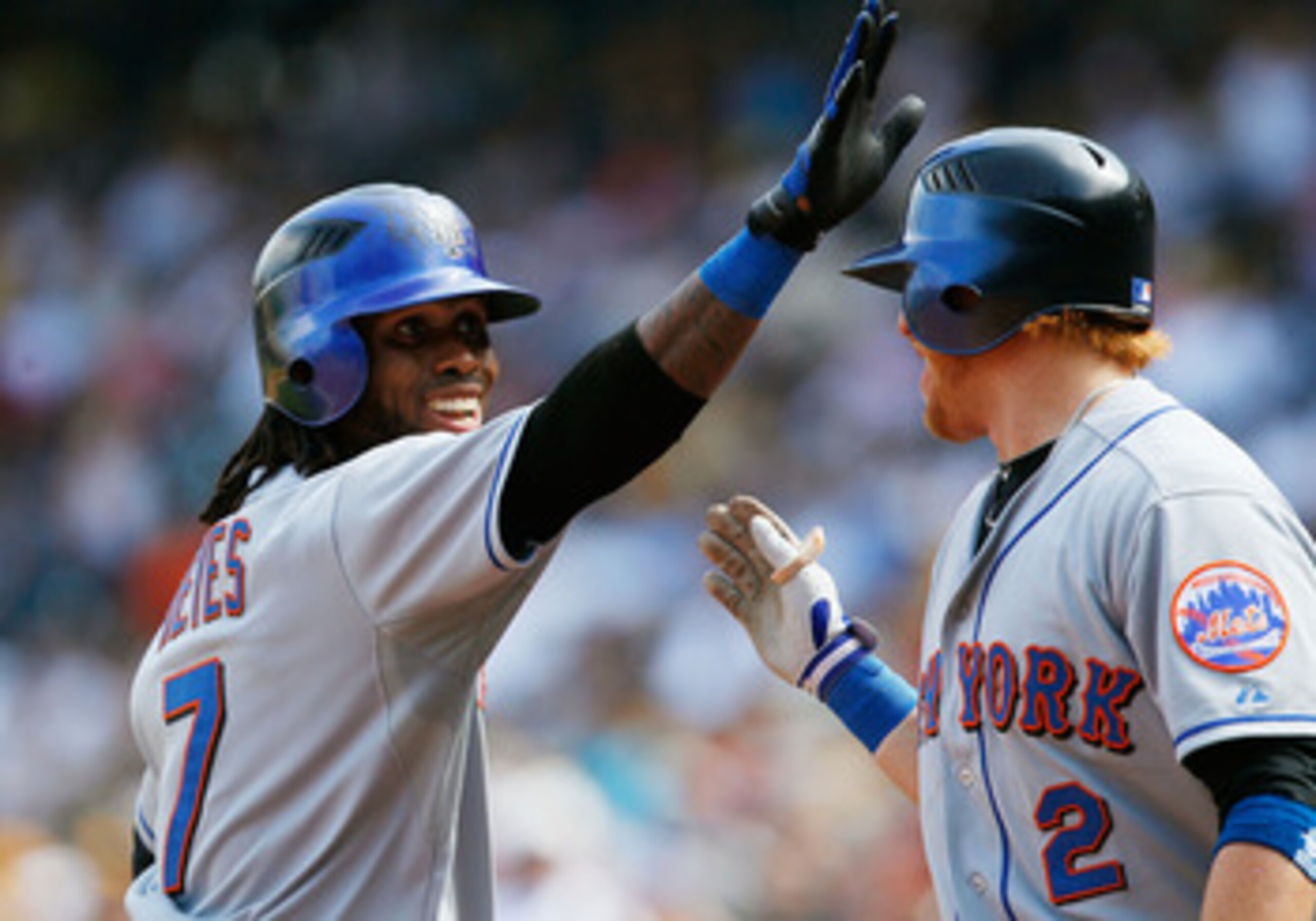 PITTSBURGH - JUNE 12: Jose Reyes #7 of the New York Mets celebrates with teammate Justin Turner #2 after hitting a home run against the Pittsburgh Pirates during the game on June 12, 2011 at PNC Park in Pittsburgh, Pennsylvania. (Photo by Jared Wickerha PITTSBURGH - JUNE 12: Jose Reyes #7 of the New York Mets celebrates with teammate Justin Turner #2 after hitting a home run against the Pittsburgh Pirates during the game on June 12, 2011 at PNC Park in Pittsburgh, Pennsylvania. (Photo by Jared Wickerha