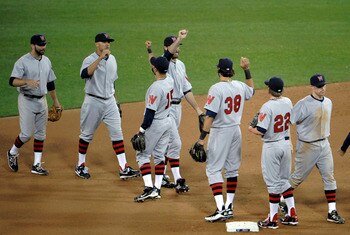 SAN DIEGO, CA - JUNE 11: Washington Nationals players high-five after the Nationals beat the San Diego Padres 2-1 at Petco Park on June 11, 2011 in San Diego, California.  (Photo by Denis Poroy/Getty Images)