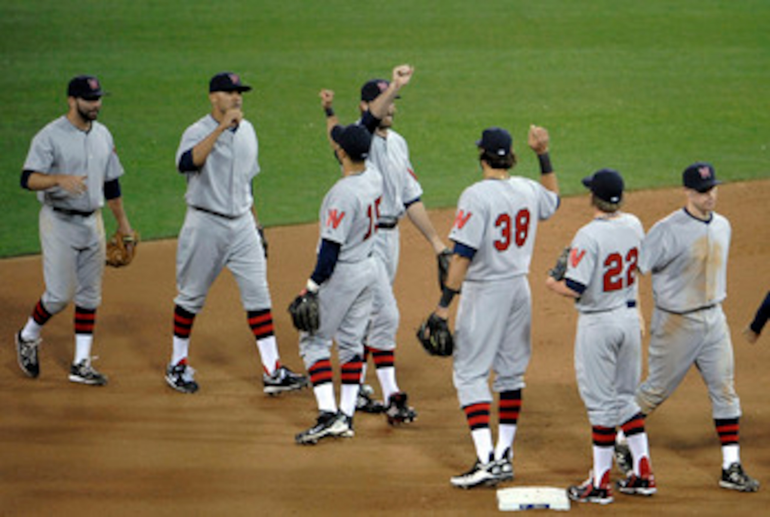 SAN DIEGO, CA - JUNE 11: Washington Nationals players high-five after the Nationals beat the San Diego Padres 2-1 at Petco Park on June 11, 2011 in San Diego, California. (Photo by Denis Poroy/Getty Images) SAN DIEGO, CA - JUNE 11: Washington Nationals players high-five after the Nationals beat the San Diego Padres 2-1 at Petco Park on June 11, 2011 in San Diego, California. (Photo by Denis Poroy/Getty Images)