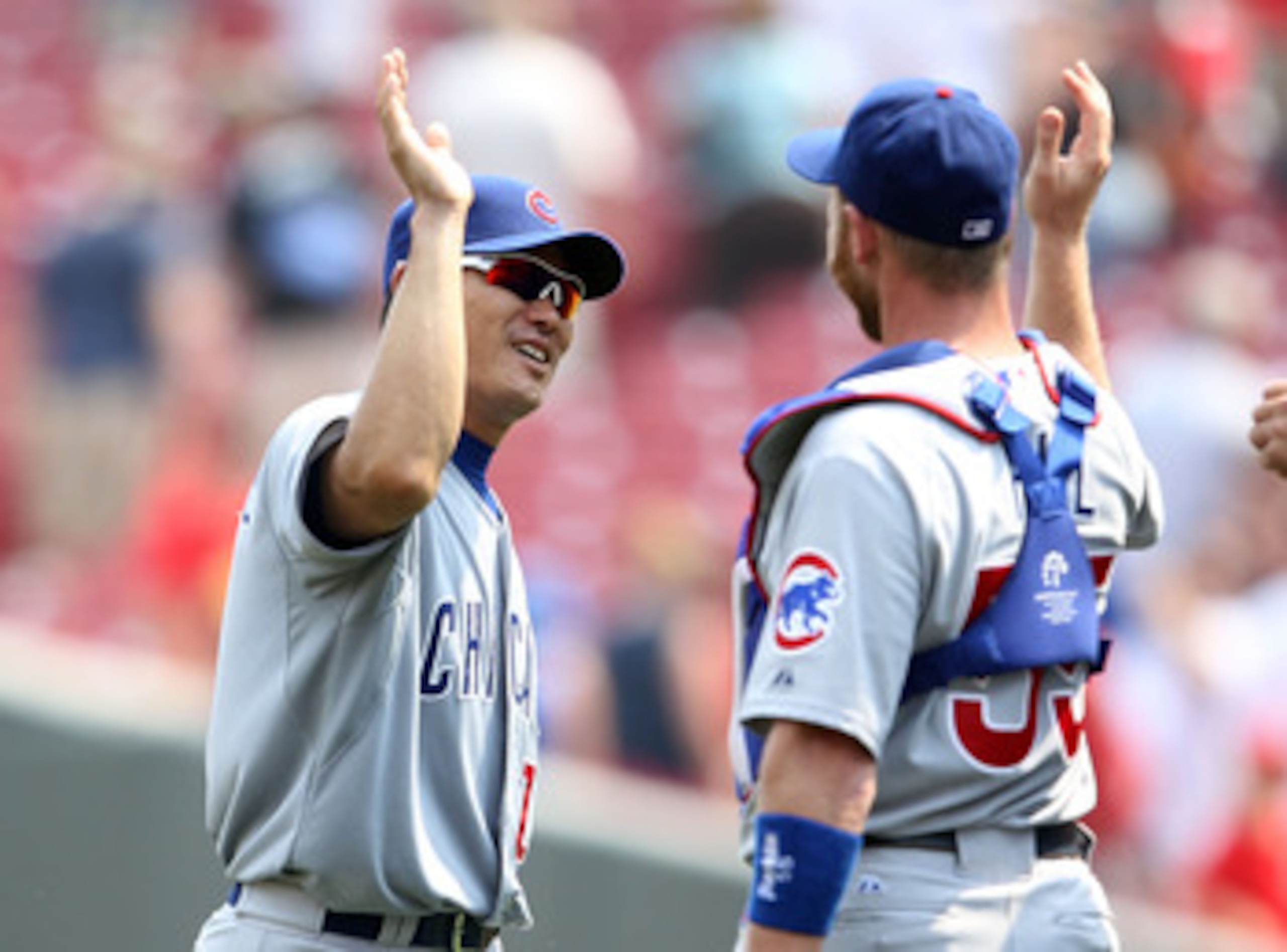 CINCINNATI, OH - JUNE 08: Kosuke Fukudome #1 of the Chicago Cubs celebrates with Koyie Hill #55 after the final out of the game against the Cincinnati Reds at Great American Ball Park on June 8, 2011 in Cincinnati, Ohio. The Cubs won 4-1. (Photo by Andy CINCINNATI, OH - JUNE 08: Kosuke Fukudome #1 of the Chicago Cubs celebrates with Koyie Hill #55 after the final out of the game against the Cincinnati Reds at Great American Ball Park on June 8, 2011 in Cincinnati, Ohio. The Cubs won 4-1. (Photo by Andy