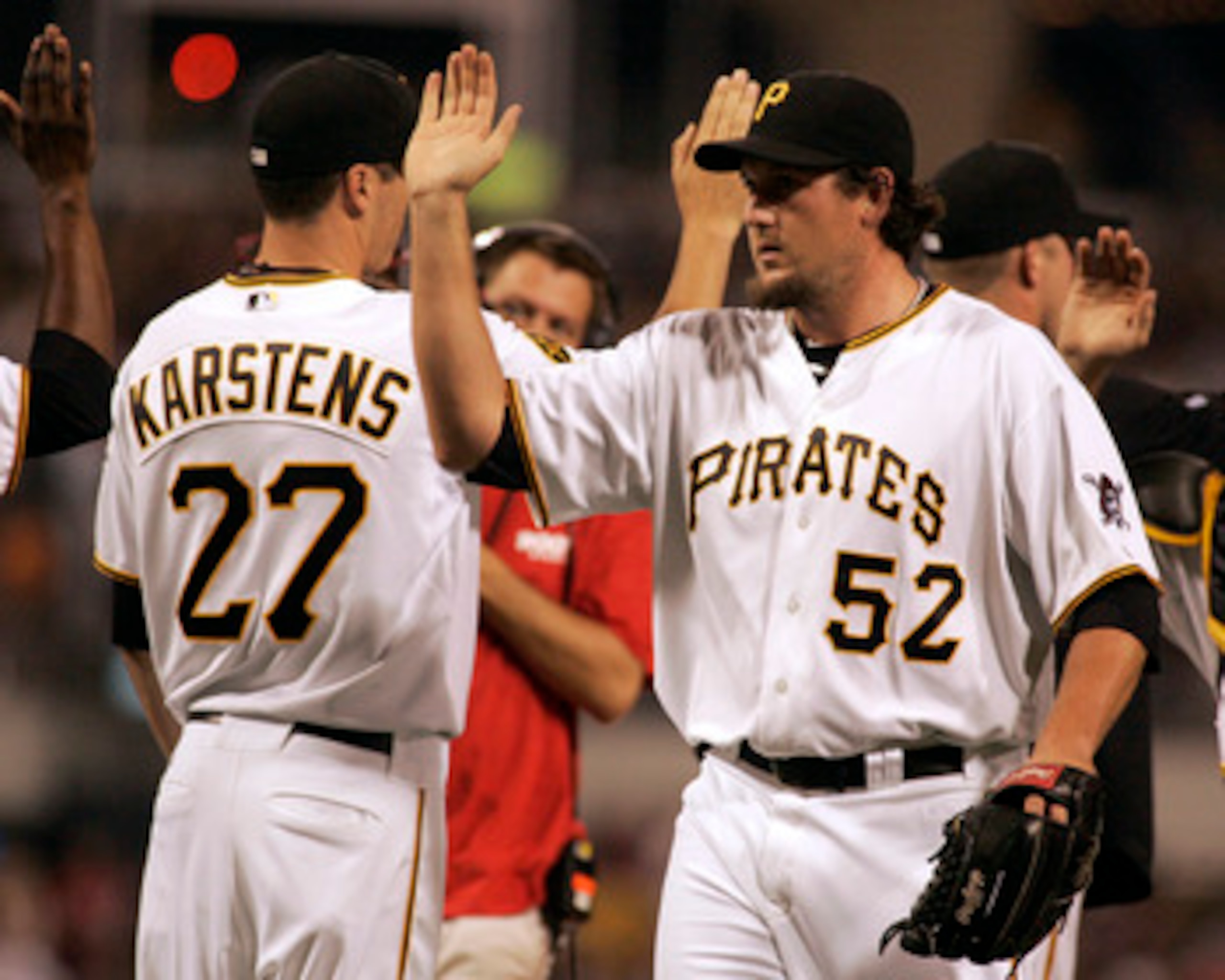 PITTSBURGH, PA - JUNE 11: Joel Hanrahan #52 of the Pittsburgh Pirates celebrates the win with teammates against the New York Mets during the game on June 11, 2011 at PNC Park in Pittsburgh, Pennsylvania. The Pirates defeated the Mets 3-2. (Photo by Jus PITTSBURGH, PA - JUNE 11: Joel Hanrahan #52 of the Pittsburgh Pirates celebrates the win with teammates against the New York Mets during the game on June 11, 2011 at PNC Park in Pittsburgh, Pennsylvania. The Pirates defeated the Mets 3-2. (Photo by Jus