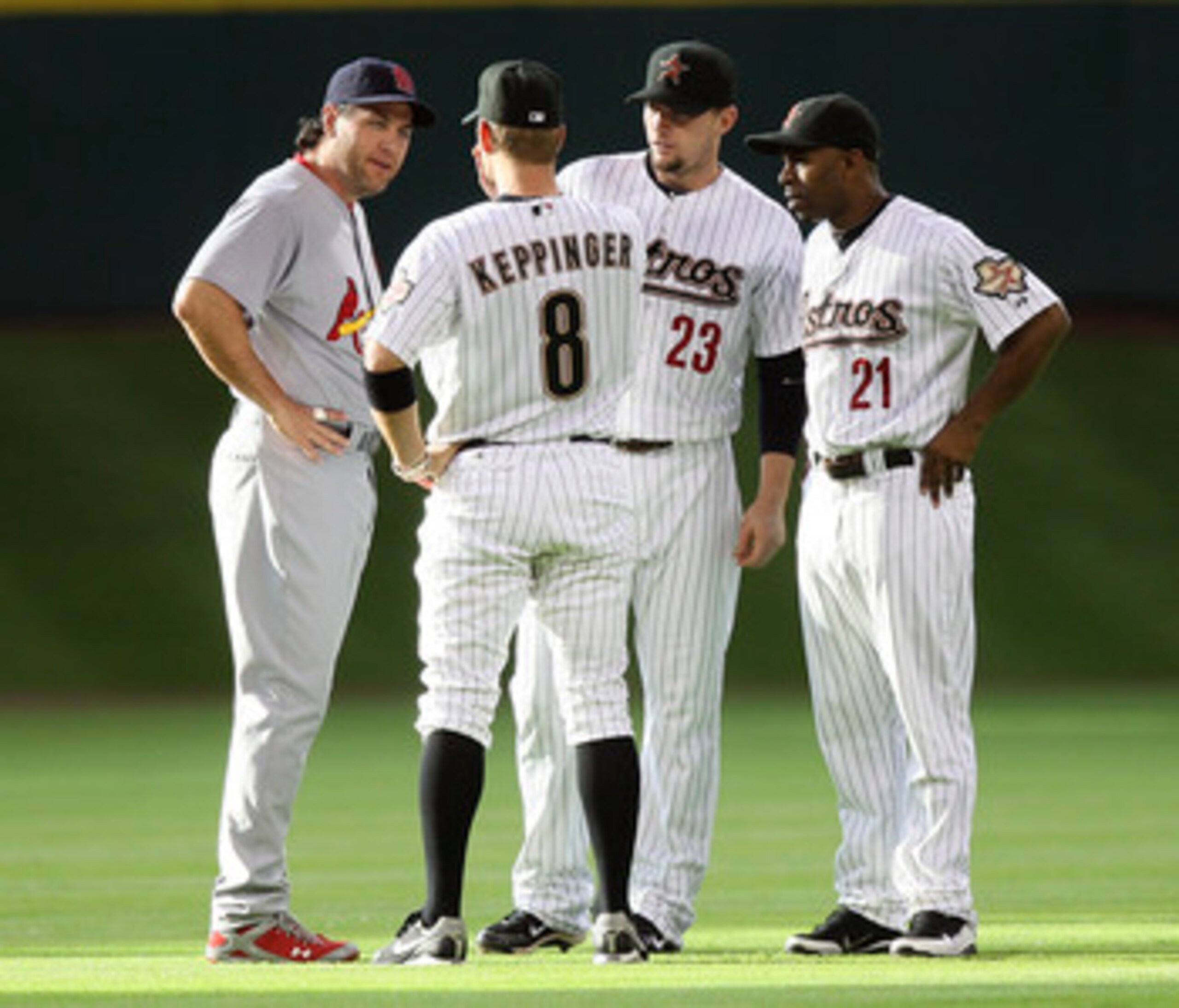 HOUSTON - JUNE 09: (L-R) Lance Berkman #12 of the St. Louis Cardinals talks with former teammates Jeff Keppinger #8, Chris Johnson #23 and Michael Bourn #21 of the Houston Astros before the start of the game at Minute Maid Park on June 9, 2011 in Houston HOUSTON - JUNE 09: (L-R) Lance Berkman #12 of the St. Louis Cardinals talks with former teammates Jeff Keppinger #8, Chris Johnson #23 and Michael Bourn #21 of the Houston Astros before the start of the game at Minute Maid Park on June 9, 2011 in Houston
