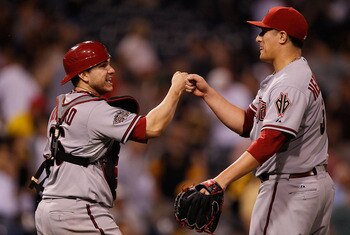 PITTSBURGH - JUNE 09:  David Hernandez #30 of the Arizona Diamondbacks is congratulated by teammate Miguel Montero #26 after their win against the Pittsburgh Pirates on June 9, 2011 at PNC Park in Pittsburgh, Pennsylvania.  (Photo by Jared Wickerham/Getty