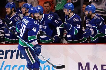 VANCOUVER, BC - JUNE 10:  Maxim Lapierre #40 of the Vancouver Canucks celebrates with his team after scoring a goal in the third period against the Boston Bruins during Game Five of the 2011 NHL Stanley Cup Final at Rogers Arena on June 10, 2011 in Vancou