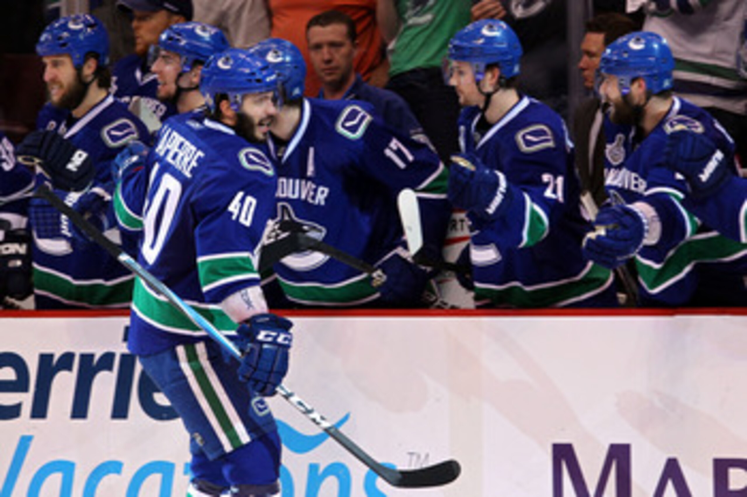 VANCOUVER, BC - JUNE 10:  Maxim Lapierre #40 of the Vancouver Canucks celebrates with his team after scoring a goal in the third period against the Boston Bruins during Game Five of the 2011 NHL Stanley Cup Final at Rogers Arena on June 10, 2011 in Vancou