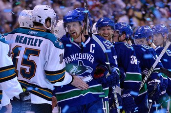 VANCOUVER, CANADA - MAY 24:  Captain Henrik Sedin #33 of the Vancouver Canucks shakes hands with Dany Heatley #15 of the San Jose Sharks after the Vancouver Canucks won Game Five of the Western Conference Finals 3-2 in the second overtime to win the serie